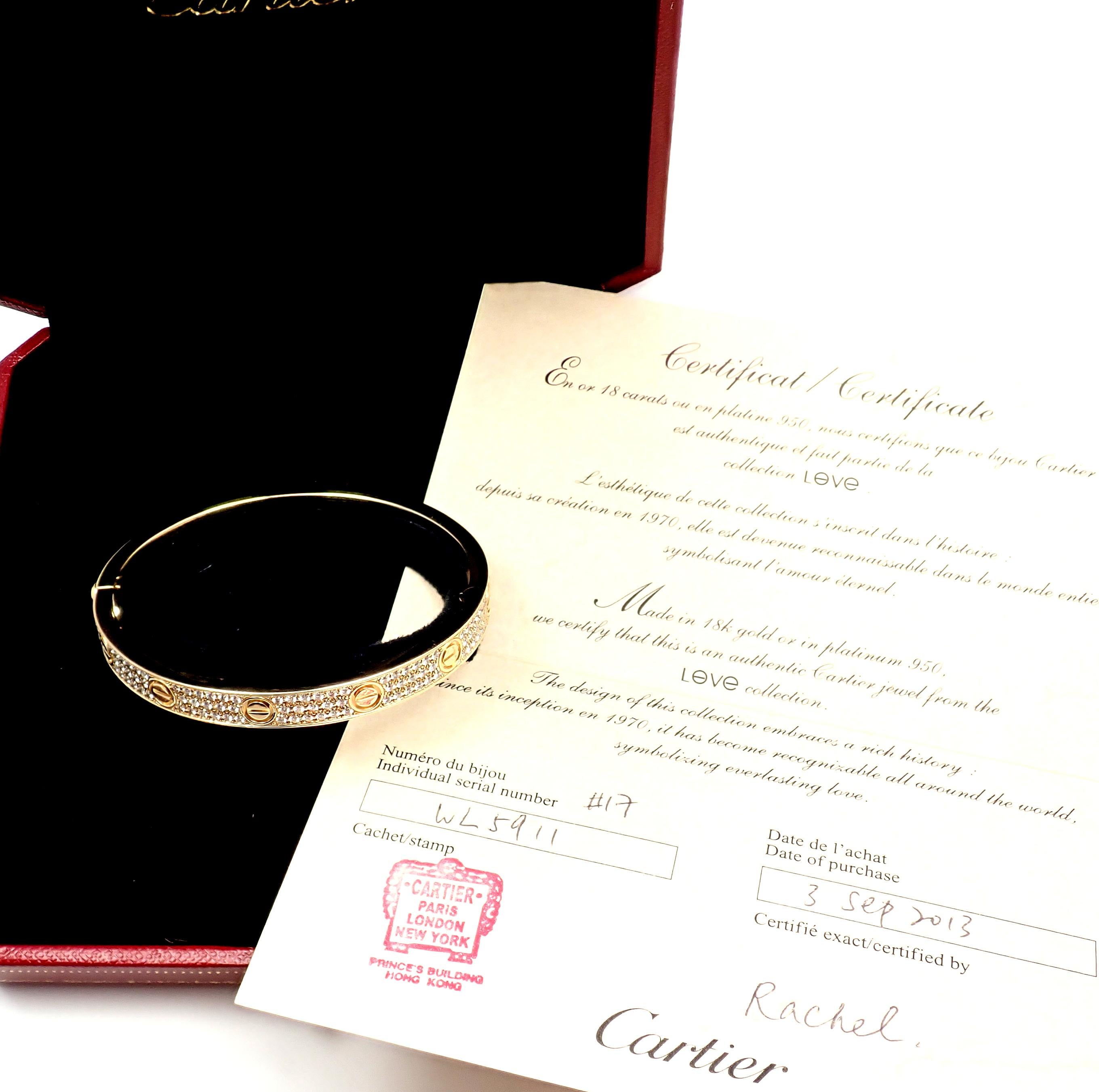 18k Yellow Gold Diamond Paved LOVE Bangle Bracelet by Cartier. 
SIZE 17. 
With 204 brilliant cut VS1 clarity, E color diamonds totaling 2 carats.
This bracelet comes with a Cartier box, and Cartier certificate.
Details: 
Size: 17
Weight: 47.3