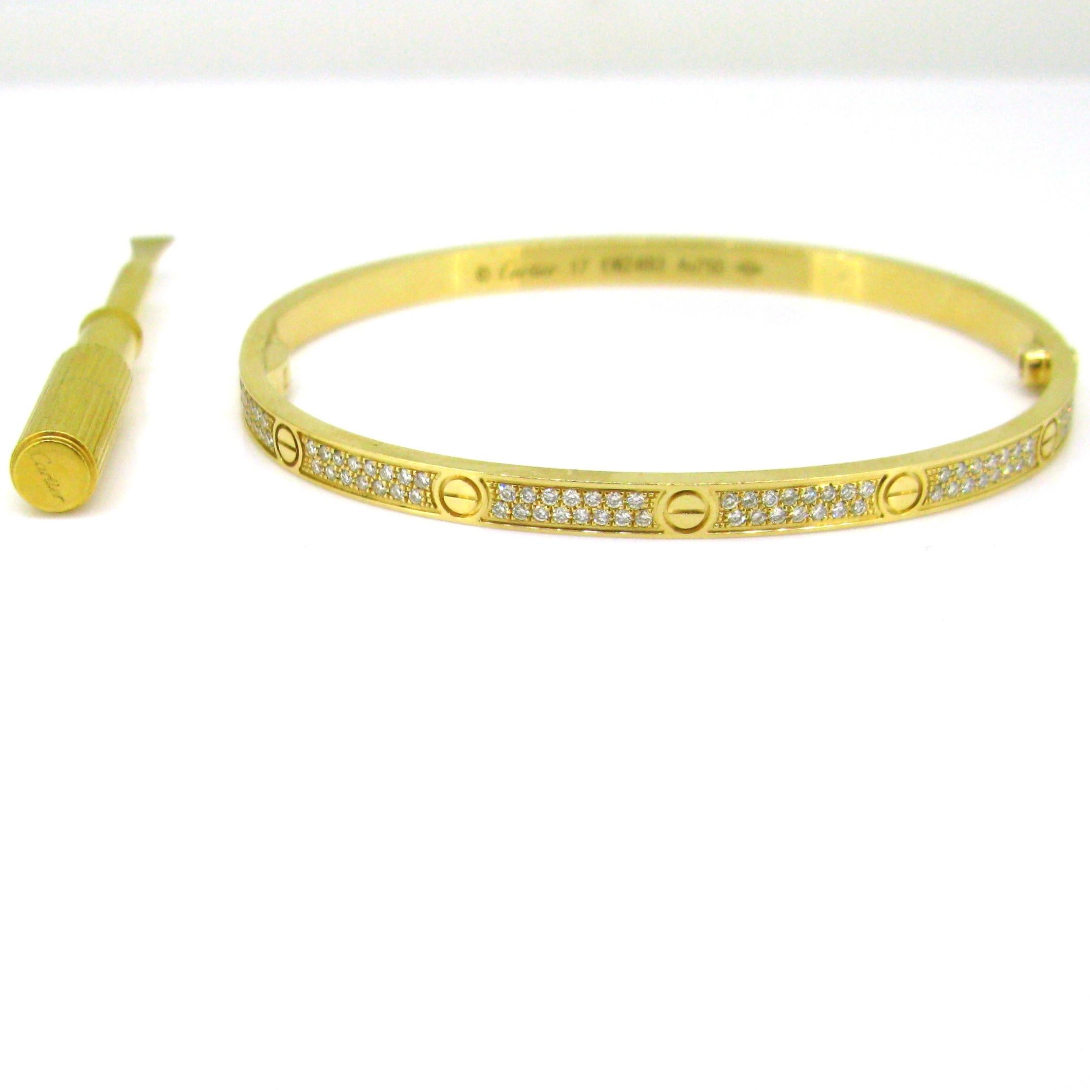 Weight: 22.68gr

Metal: 18kt yellow gold

Condition: Very Good

Signature: Cartier, nºEWZ483

Size: 17

Stones: 177 Diamonds
• Cut: Brilliant
• Total carat weight:1ct approximately
• Colour: E/F
• Clarity: VS1

Comments: This beautiful Cartier Love