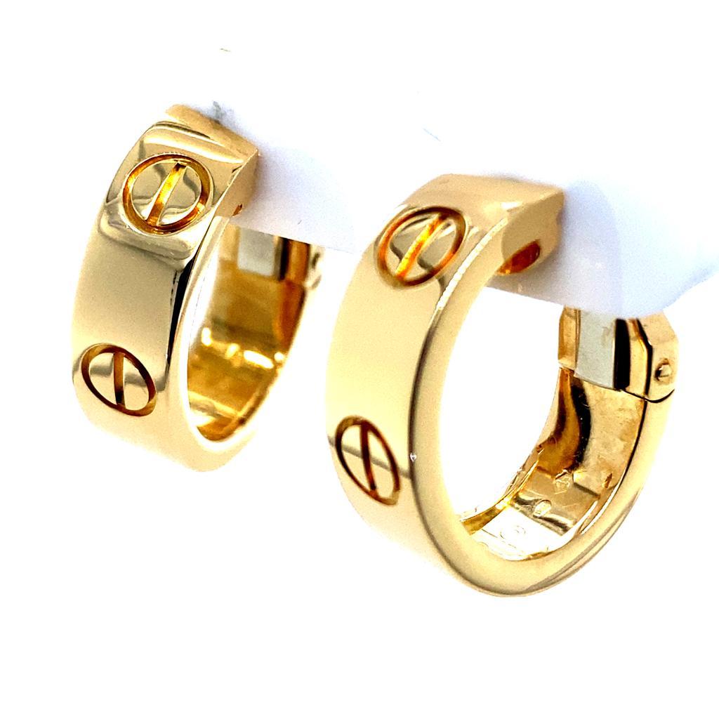 A pair of Cartier Love earrings in 18 karat yellow gold.

A classic pair of Cartier earrings, featuring the iconic Love Design, crafted in 18 karat yellow gold with post and clip fittings.

Signed 