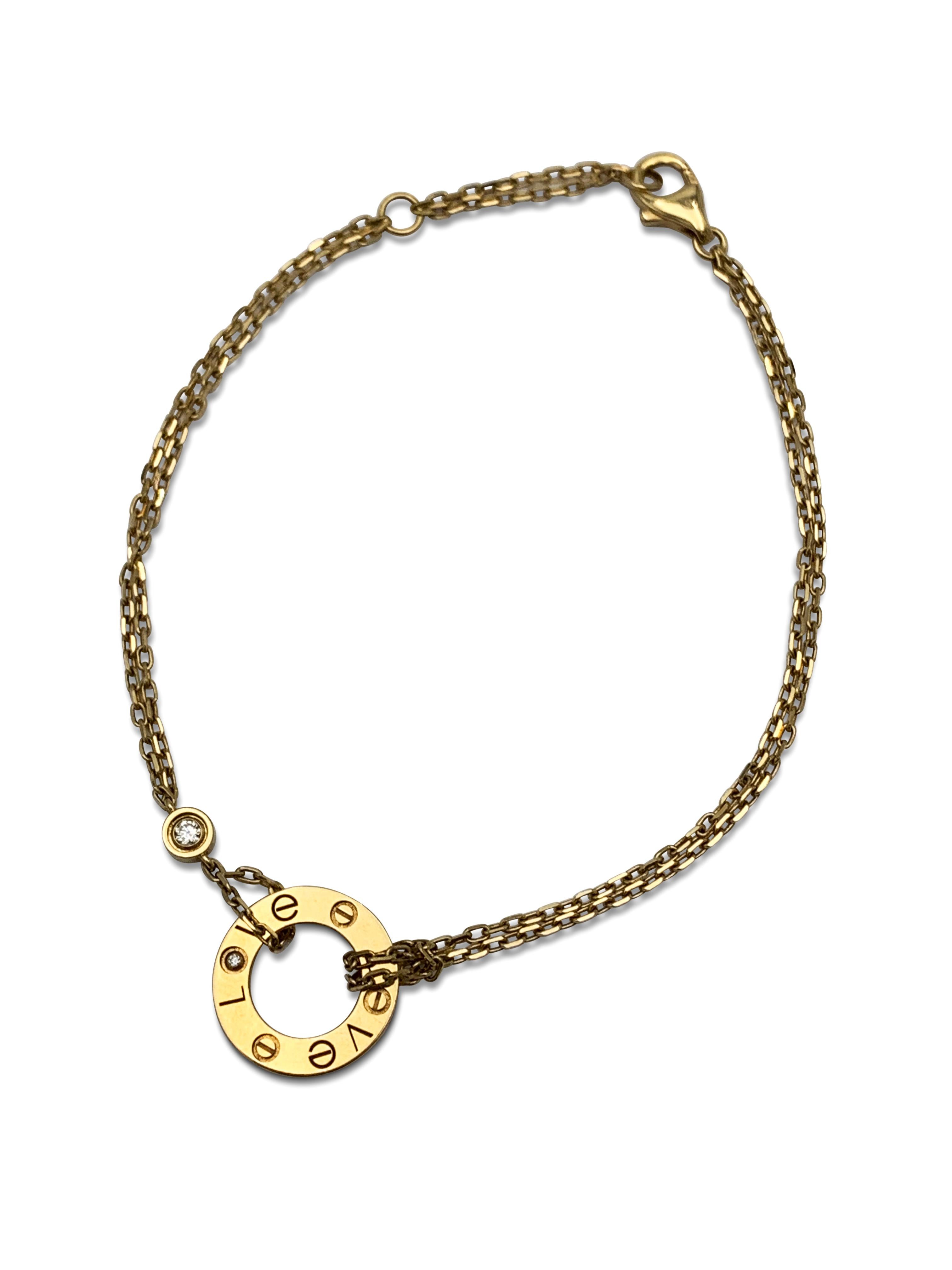 Authentic chain and ring charm bracelet from the Cartier Love collection. Made in 18 karat yellow gold and double strand oval link chain with a half-inch round ring and screw top motifs set with two round brilliant cut diamonds of approximately 0.30