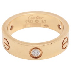 Anello Cartier Love con mezzo diamante