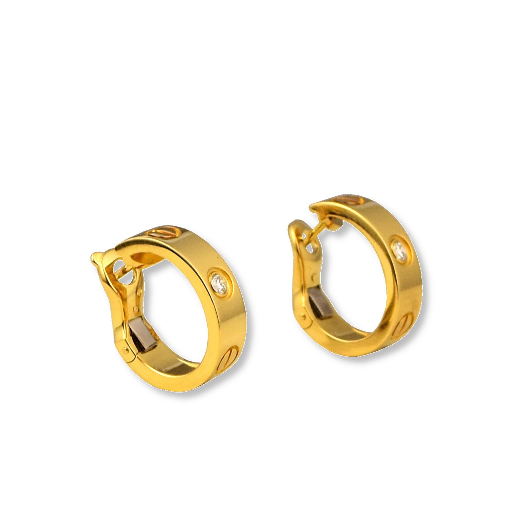 Brand: Cartier

Collection: LOVE

Style:  Earrings​​​​​​​

Metal: Yellow  Gold

Metal Purity :18K

Stones: Round Brilliant Cut

Size:  5.7 mm

Total Item Weight(Grams): XX

Hallmark: Cartier; 18k; Serial #

Includes: 24 Month Brilliance Jewels