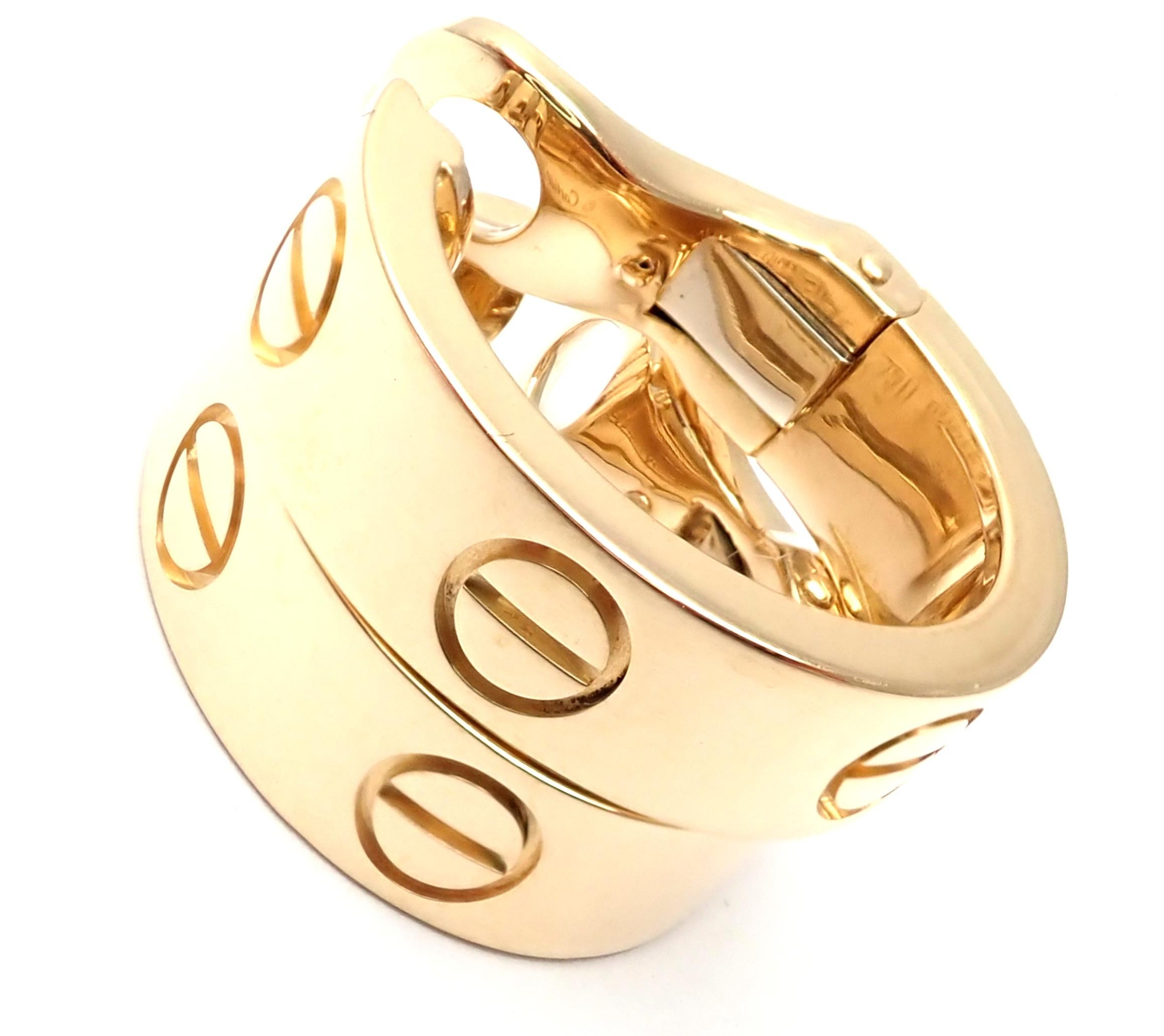 18k Yellow Gold Love Hoop Earrings by Cartier. 
These earrings come with Cartier certificate of authenticity.
***These Earrings are made for pierced or not pierced ears, they come with screw in posts.
Details:
Measurements: 18mm x 6mm
Weight: 12.1