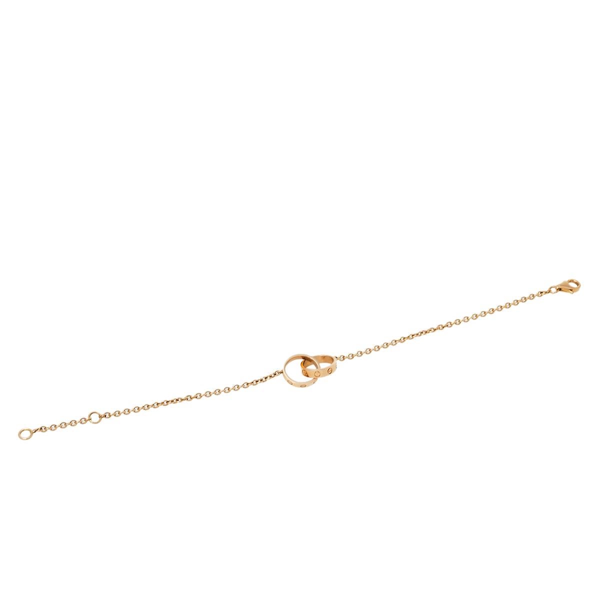 We fell in love with this Cartier Love bracelet at first glance. Look at its gorgeous yet subtle accents and picture how it will beautifully sit on your wrist and charm your peers. The 18K rose gold creation features a slender chain that carries two