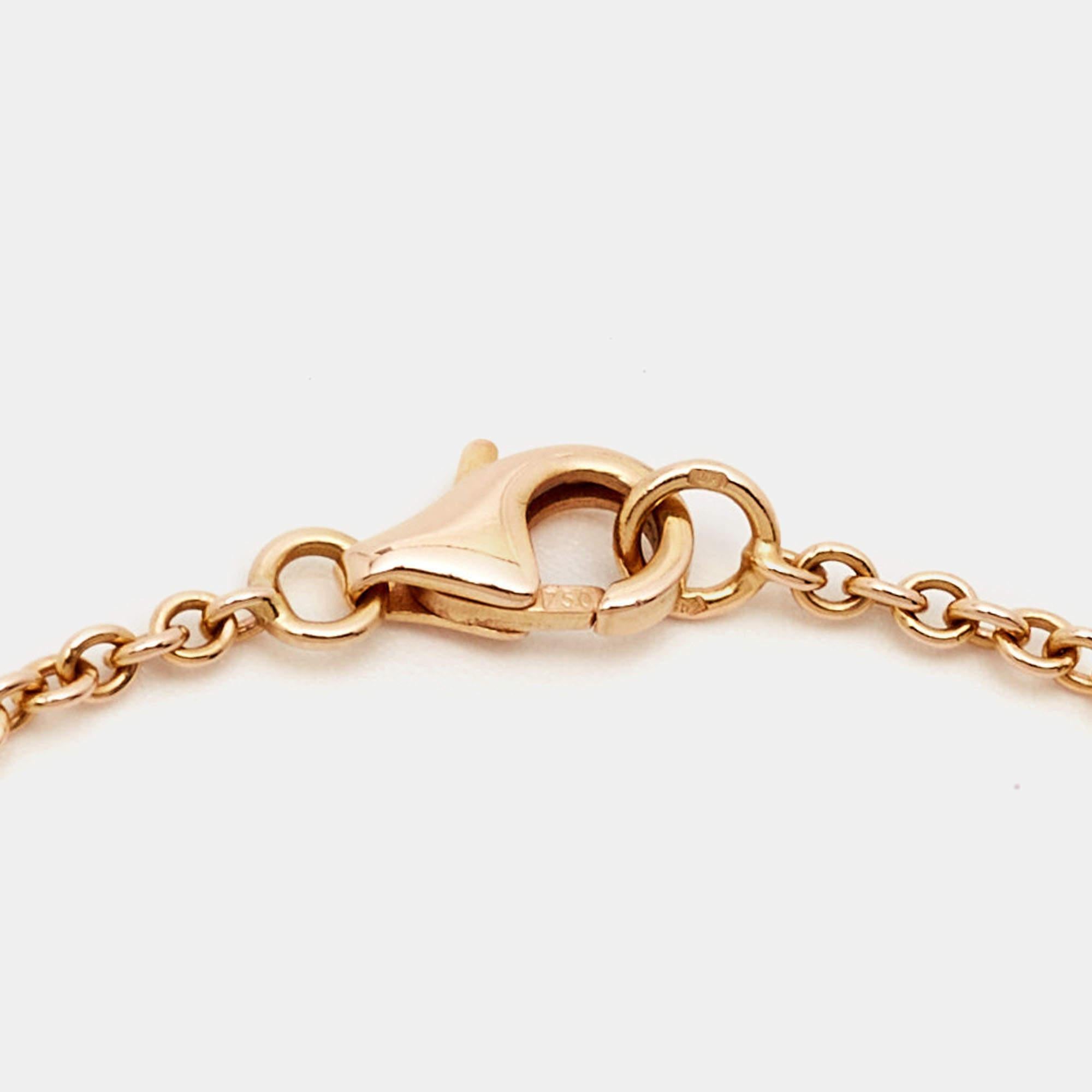 Celebrate timeless love with this bracelet from Cartier's Love collection. It is sculpted from 18k rose gold gold, and the chain holds two magnificent hoops interlocked with one another. Both the rings carry the iconic screw motifs—a signature of