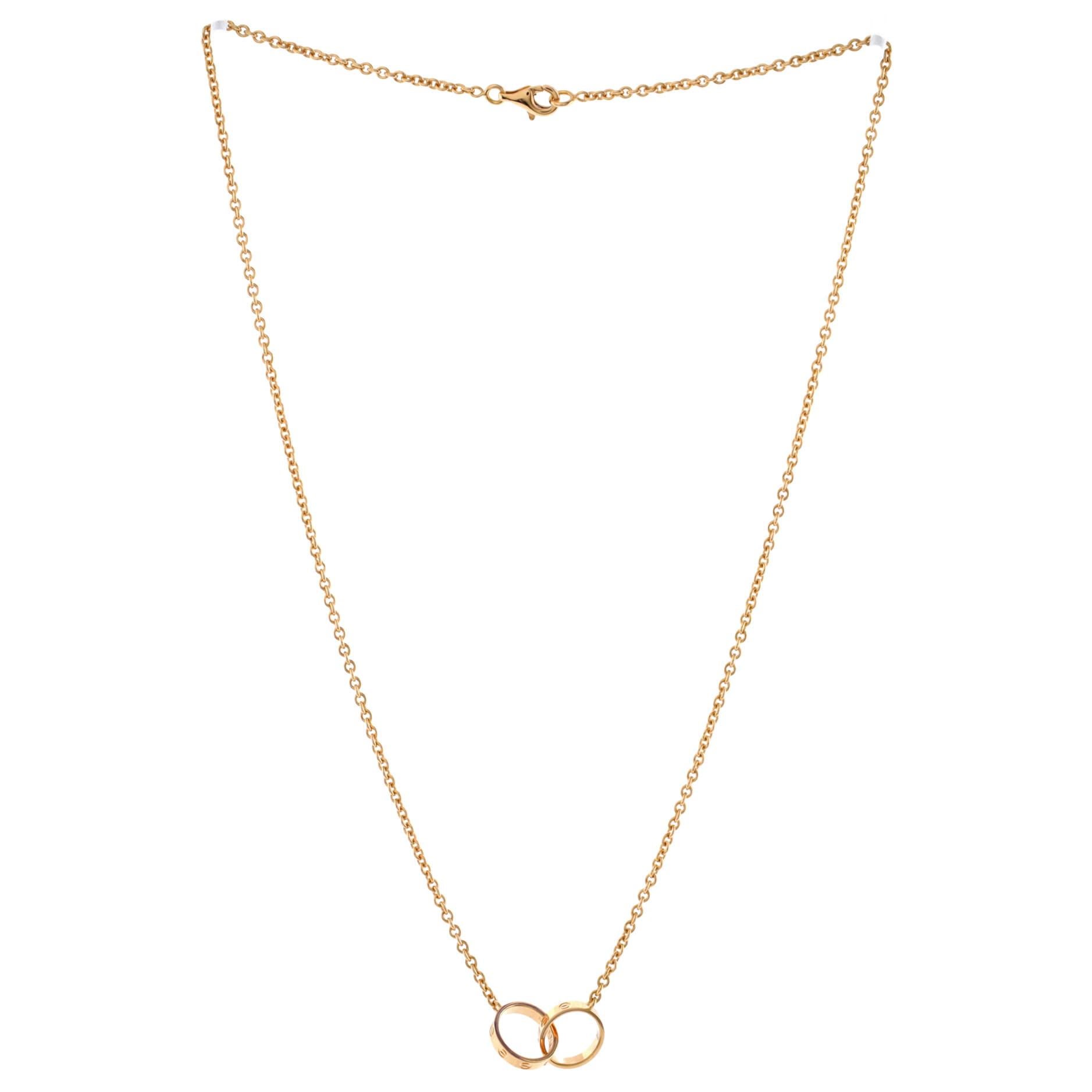 Cartier Love Interlocking Halskette aus 18 Karat Roségold im Zustand „Gut“ in New York, NY
