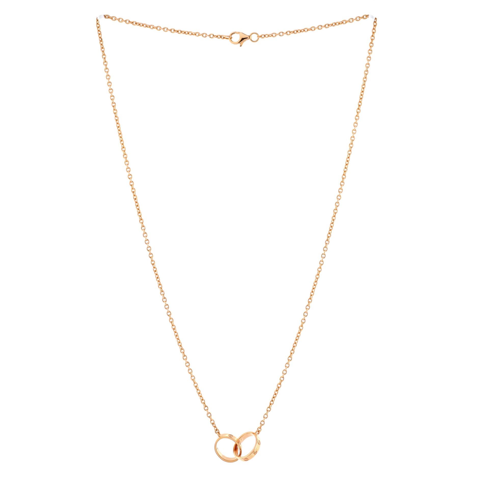 Cartier Love Interlocking Halskette aus 18 Karat Roségold im Zustand „Gut“ in New York, NY