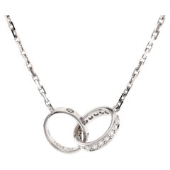 Cartier Love Interlocking Necklace 18k White Gold and Diamonds
