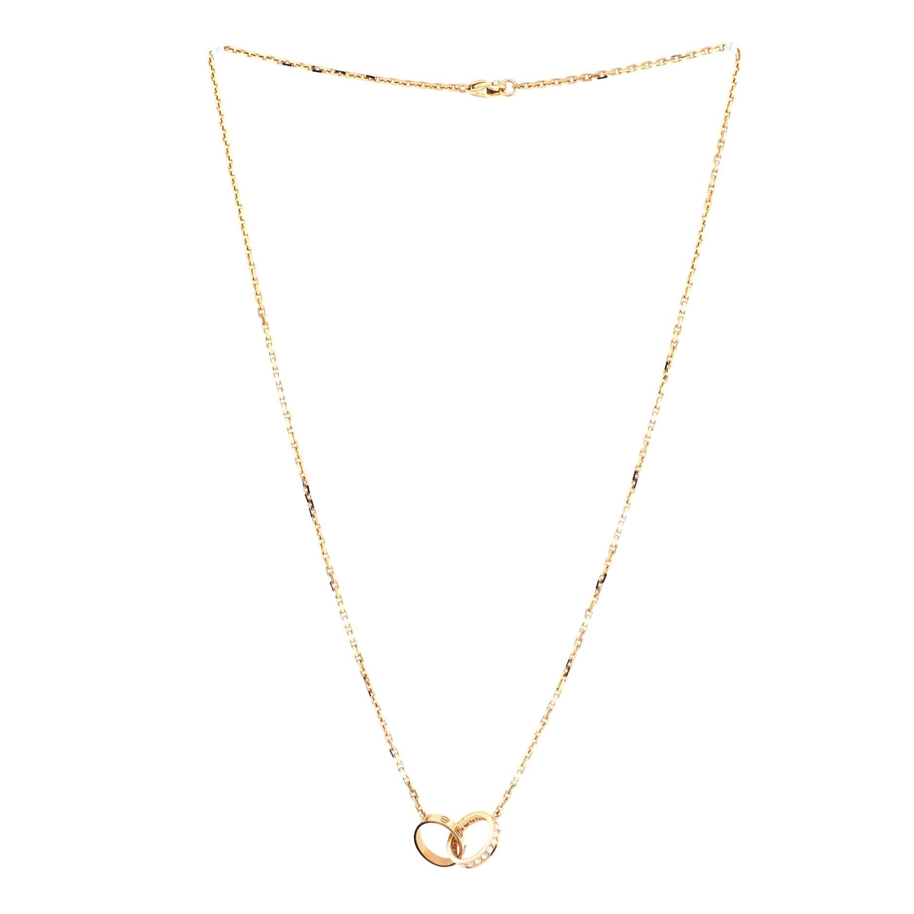 Cartier Love Interlocking Halskette aus 18 Karat Gelbgold mit Diamanten im Zustand „Gut“ in New York, NY