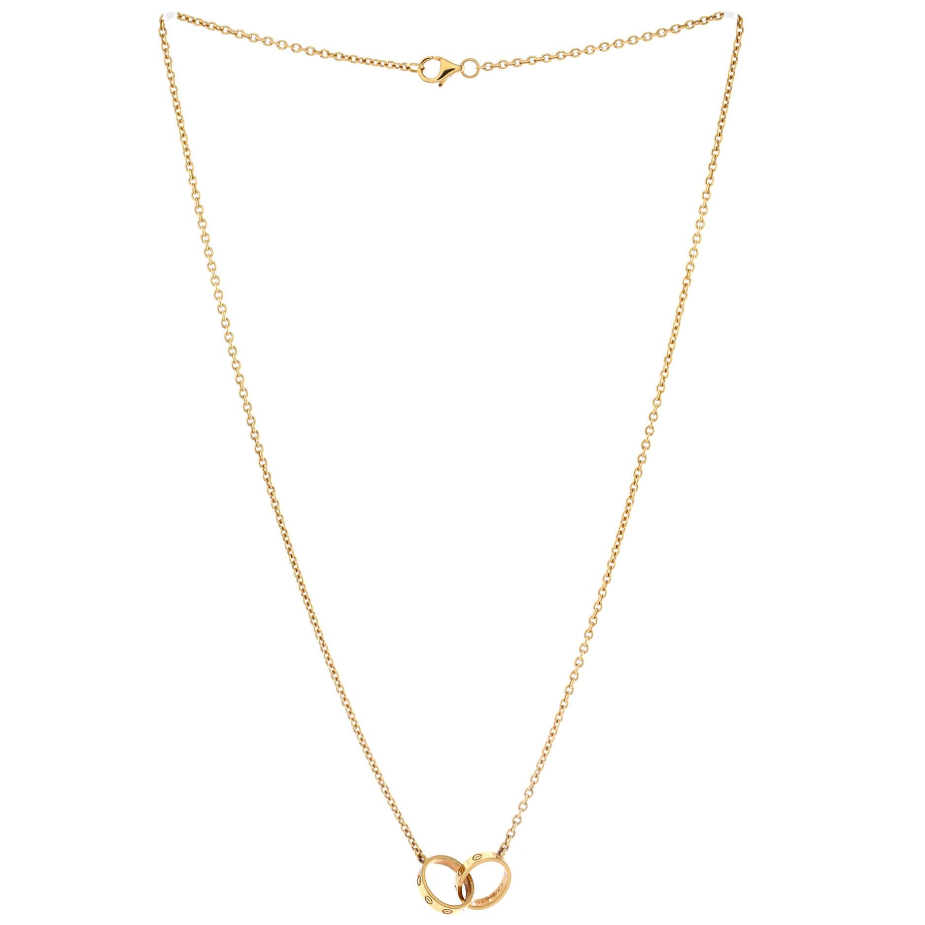 Cartier Love Interlocking Halskette aus 18 Karat Gelbgold im Zustand „Gut“ in New York, NY