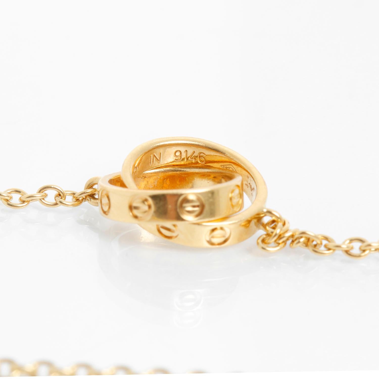 Women's Cartier Love Interlocking Necklace 18K Yellow Gold For Sale