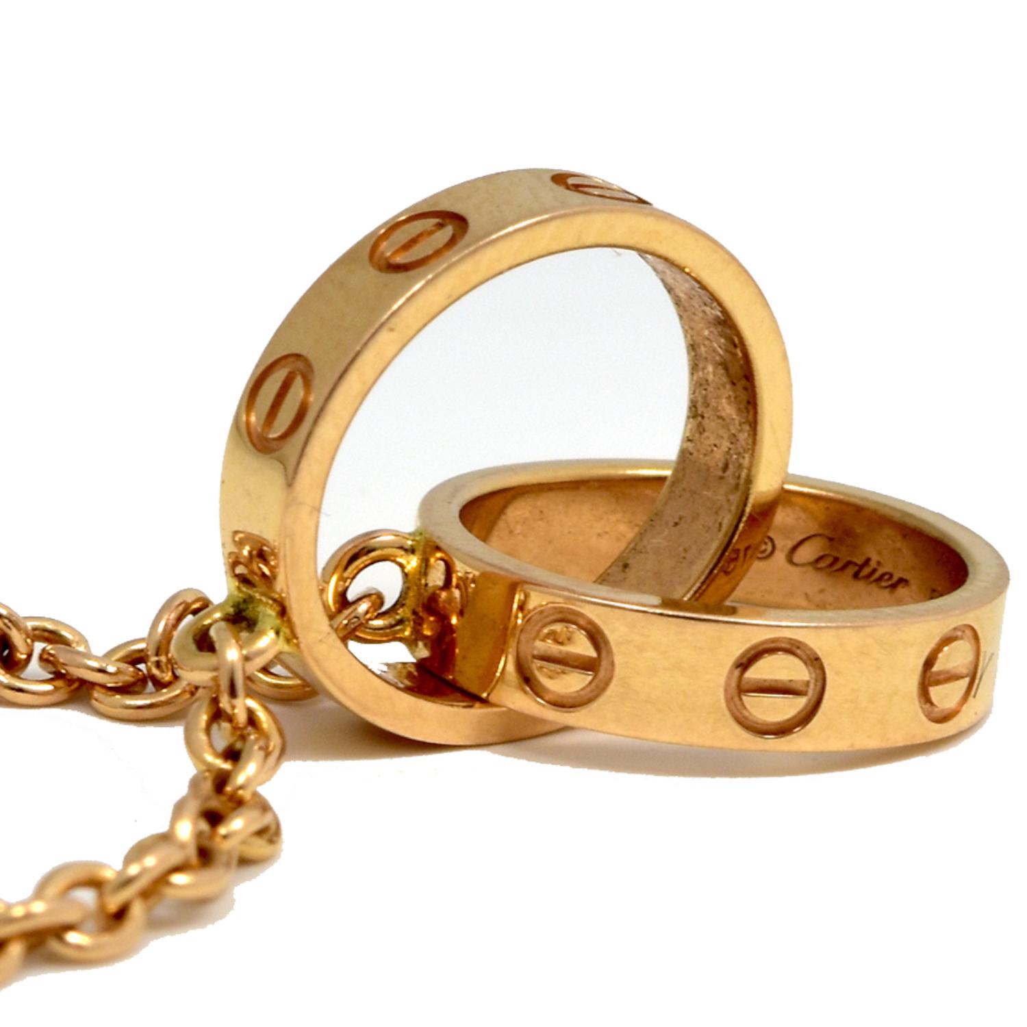 Cartier Love Interlocking Pendant Chain Bracelet in 18 Karat Rose Gold In Good Condition In Miami, FL