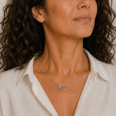 Collier Cartier LOVE avec pendentif entrelacé, en or blanc 18 carats, avec certificats