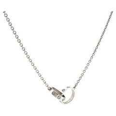 Collier Cartier LOVE avec pendentif entrelacé, en or blanc 18 carats, avec certificats