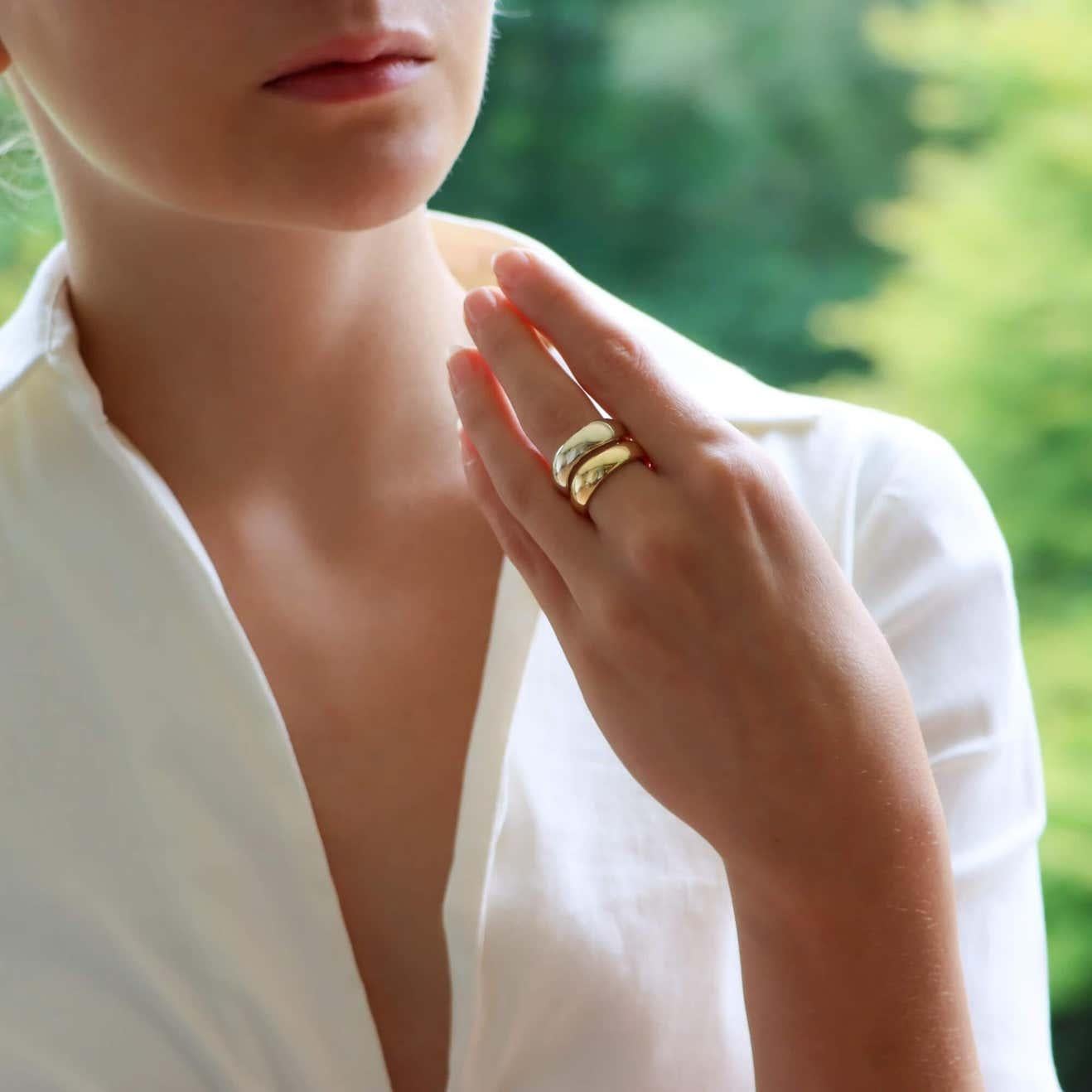 The ring is composed of two bands carved to perfectly fit together. The ring can easily be worn for every day as a standalone piece, or alternatively, stacked up amongst other pieces.

Brand: Cartier
Metal: 18K White & Yellow Gold
Ring Size: 6 US
It