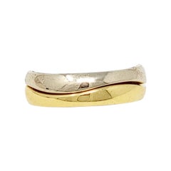 Cartier Bague empilable Love Me en or jaune et blanc 18 carats, sertie d'un anneau