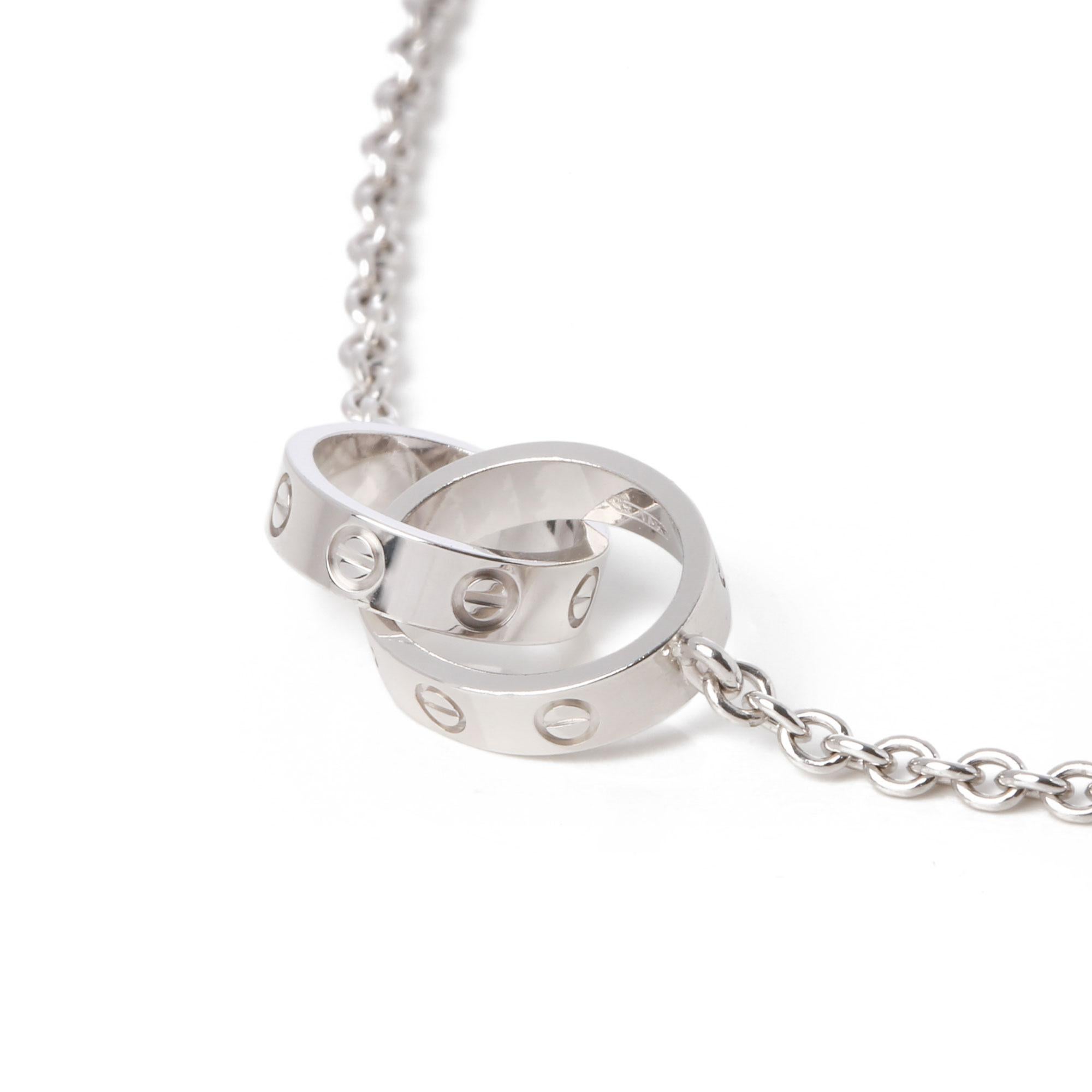 This necklace by Cartier is from their Love collection and features two interlinking pendants with their iconic screw detailing, set in 18ct white gold. Accompanied with a Xupes presentation box. Our Xupes reference is COMJ563 should you need to