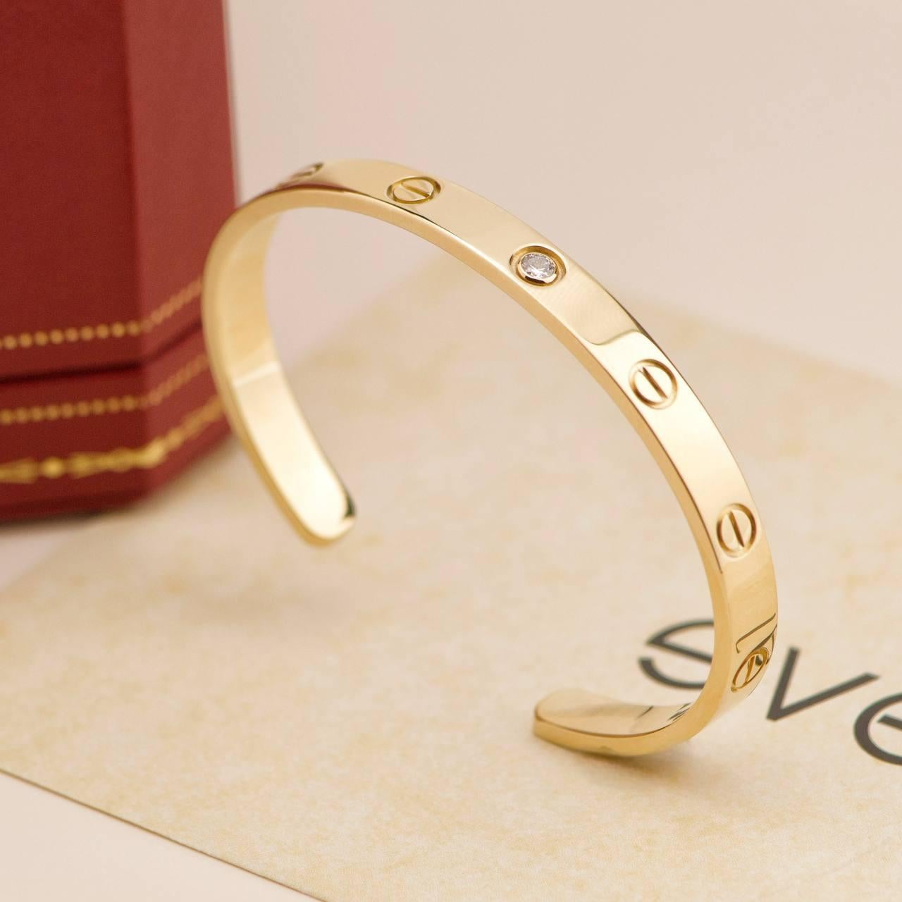 SKU	33301777
Kommt mit	Vollständiger Satz (Box + Karte)
Datum	2018
Modell	B6029817
Seriennummer	EM****
Größe	17 (ca. 14m - 14,9cm Handgelenk) 
Metall	18k Gelbgold
Steine	Diamant
Gewicht	24.57