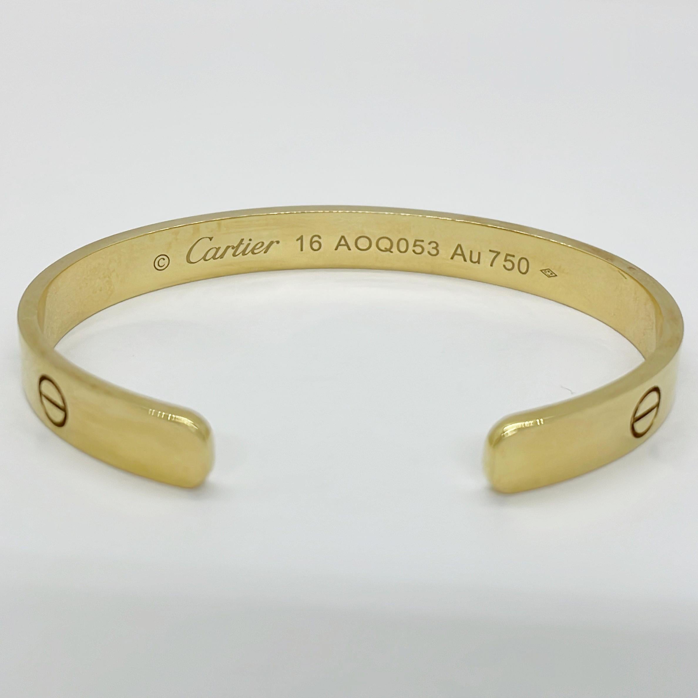 Brand : Cartier
Description: Cartier Love Open Bangle Bracalet 
Metal Type:  750YG/Yellow Gold
Weight  22.0g
Size: 16
Condition: Preowned; small signs of wearing
Box -    Included
Papers -  Not Included
