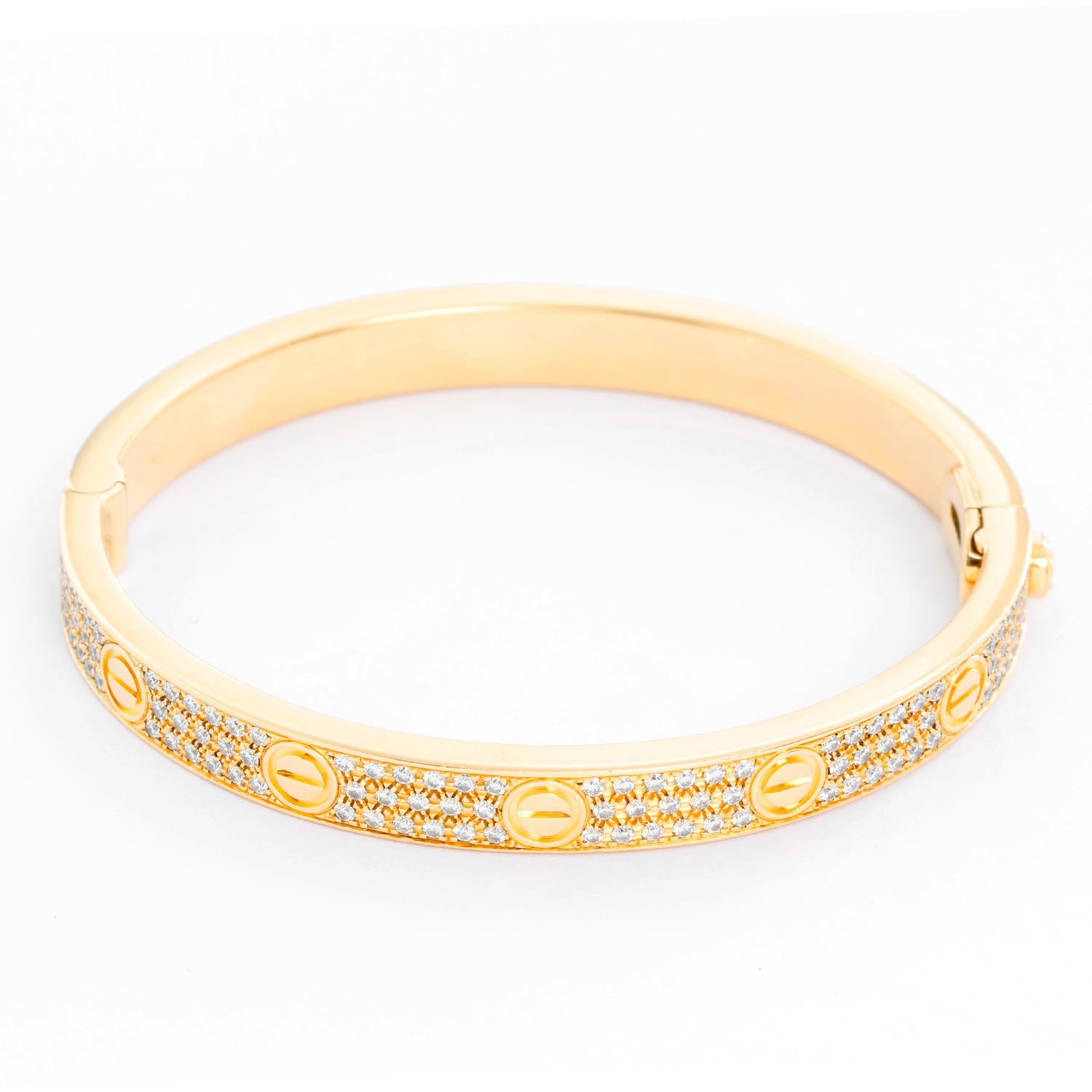 Cartier Love Pave Diamond Yellow Gold Bracelet  - Cartier Love bracelet, 18K yellow gold, set with 204 brilliant-cut diamonds totaling 2 cts. Size 17. Preowned with Cartier box and service papers.