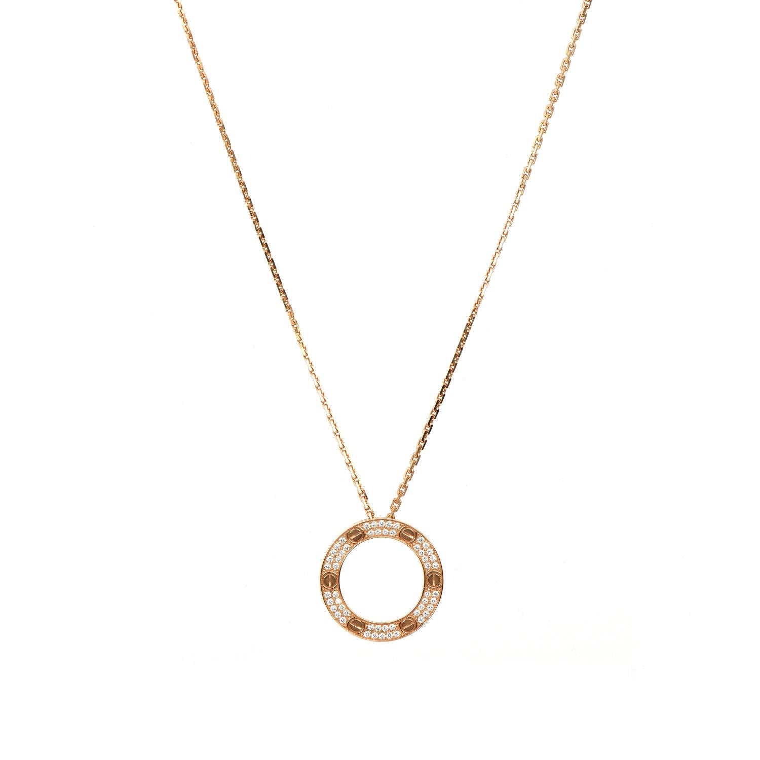 From the well-known House of Cartier, this estate LOVE Collection piece is an exquisite encounter between the classic & luxurious look.  

The round-shaped pendant & Chain are crafted in solid 18K Rose Gold. Adorning the pendant, there are 54