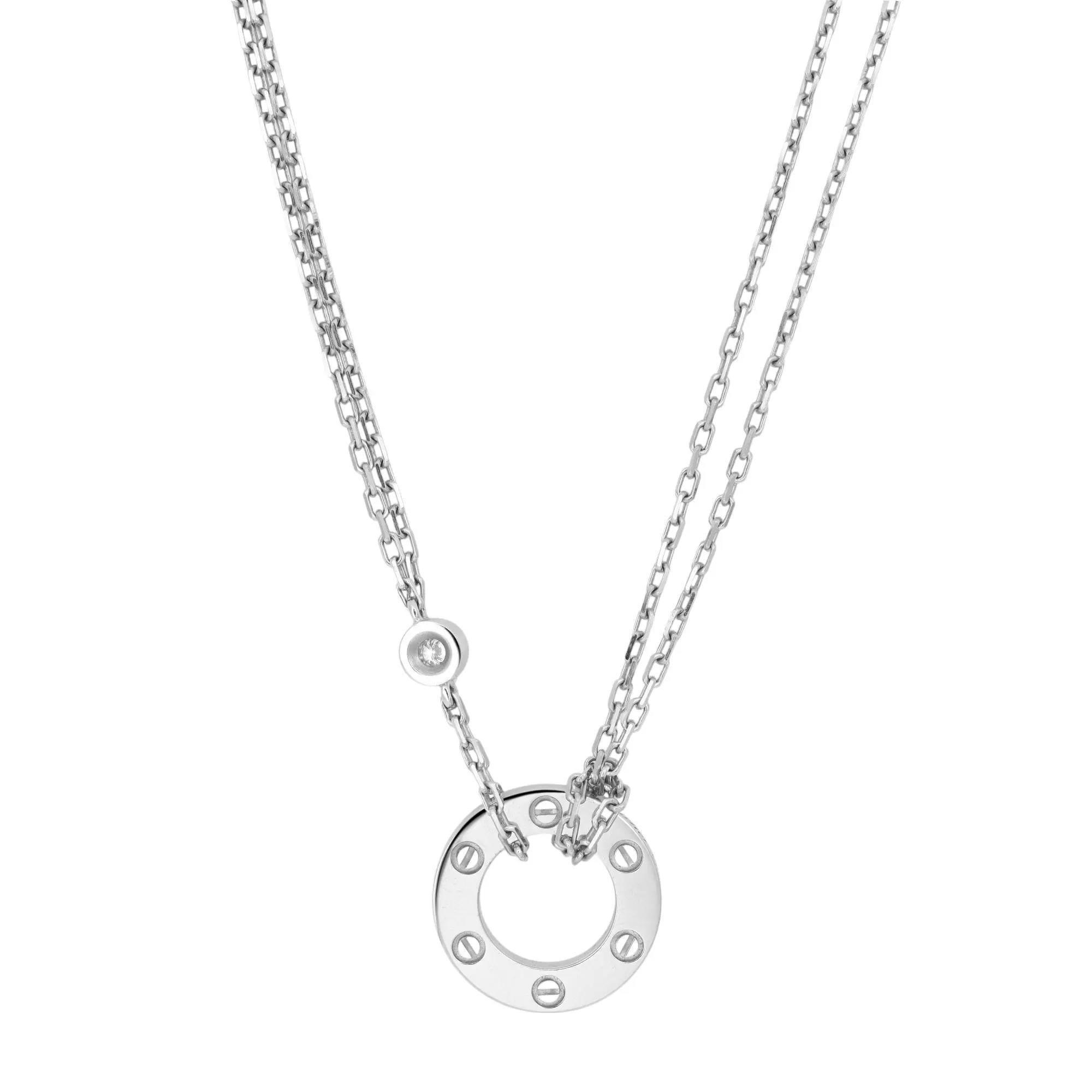 Collana con ciondolo Cartier Love tempestata di 2 diamanti rotondi taglio brillante del peso di 0,03 carati. Realizzato in pregiato oro bianco 18 carati. La lunghezza della collana è di 16 pollici. Dimensioni del ciondolo: 13 mm. Diametro interno