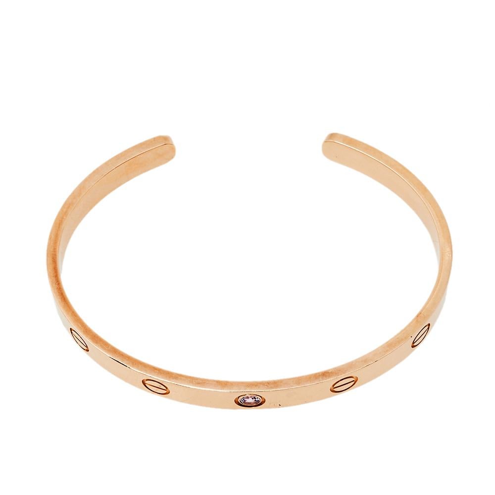 We fell in love with this Cartier Love bracelet at first glance. Look at its gorgeous yet subtle accents and picture how it will beautifully sit on your wrist and charm your peers. The creation is crafted from 18K rose gold in an open cuff style and