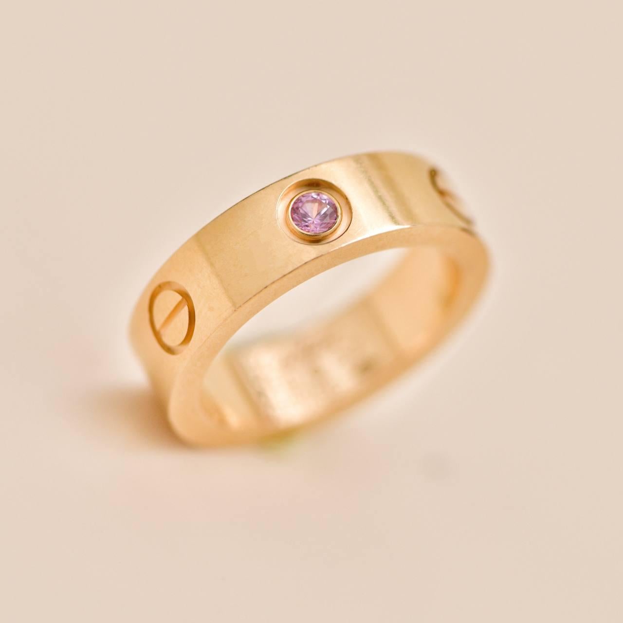 Bague Cartier Love en or rose 18 carats saphir rose Taille 52 Unisexe en vente