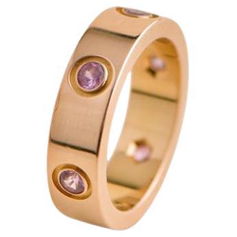 Cartier Bague Love en or rose et saphir, taille 53