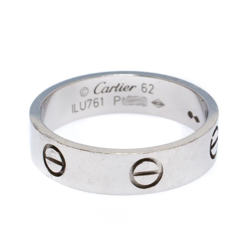 Cartier presents a ring that is timeless and classy. This elegant accessory features a platinum band with signature screws all over to symbolize commitment. Complete with brand engravings, this iconic ring of love is a purchase to treasure for