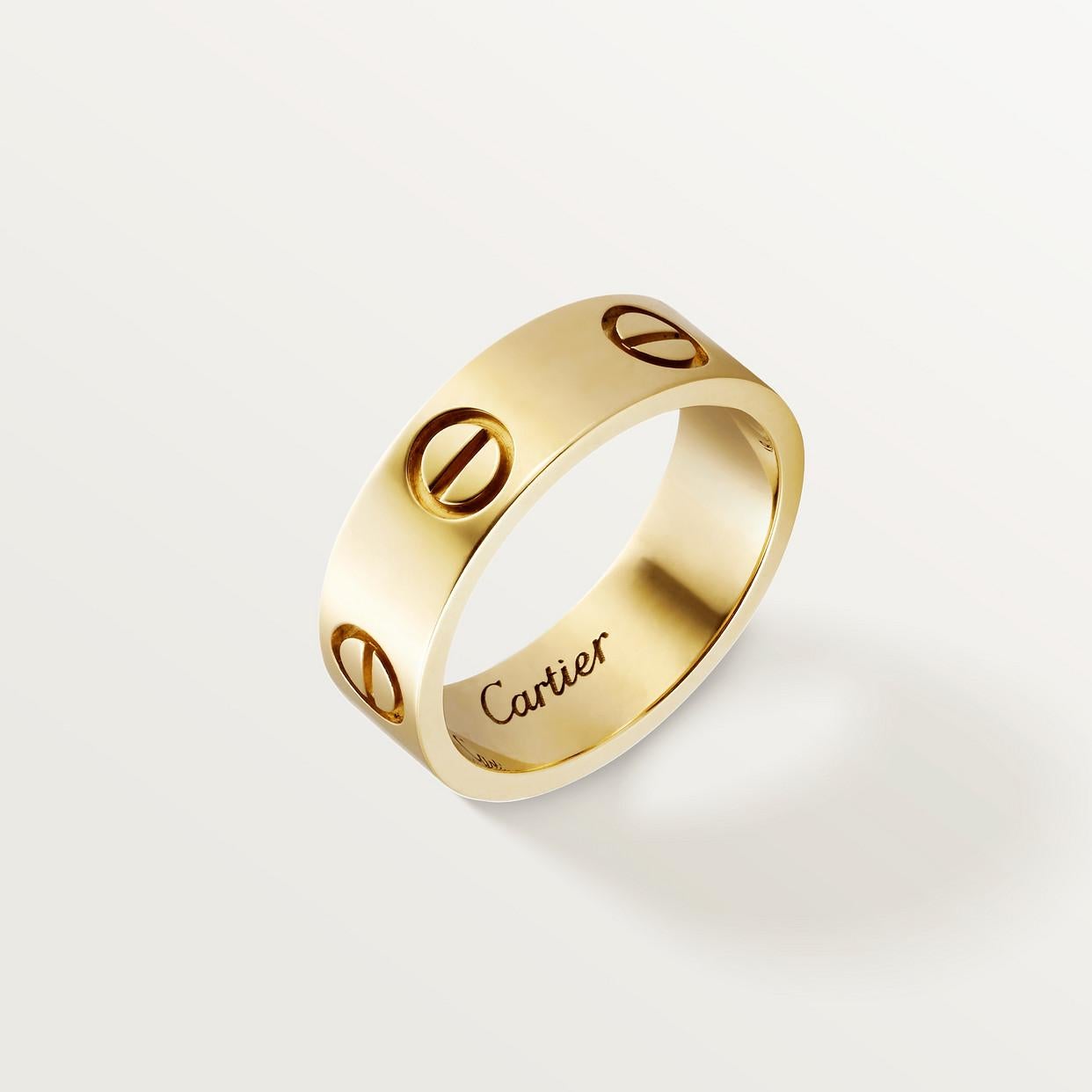 The Cartier Love ring made of 18K gold and designed with a screw motif meant to symbolise everlasting love and commitment and is often worn as a sign of devotion or as a wedding band.

The ring's sleek and modern design makes it a versatile piece