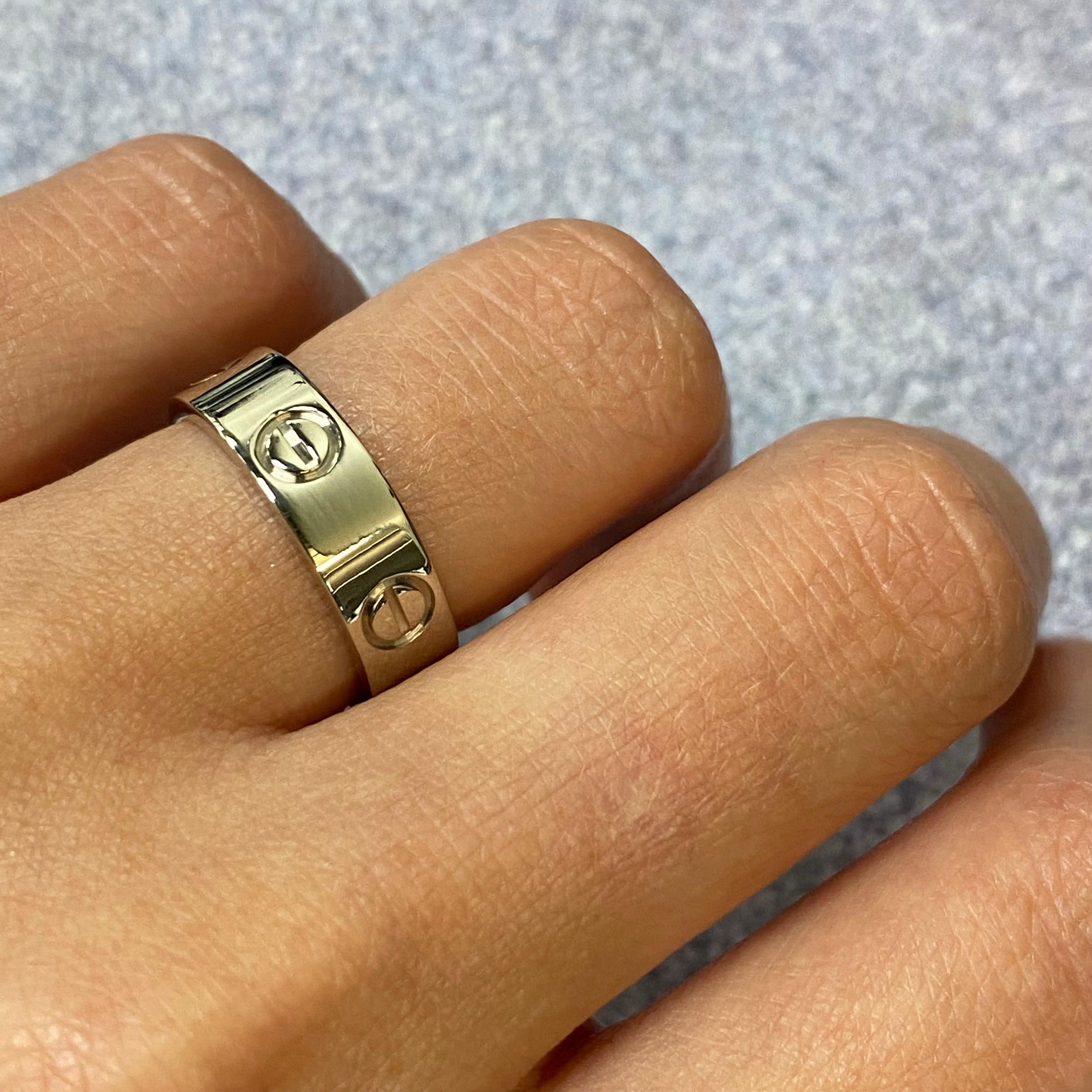 Cartier Love ring in 18K white gold. Width: 5.5mm. Ring size 51 US 5.75. Great pre-owned condition. Original box and papers are not included. Comes with presentable gift box. 
