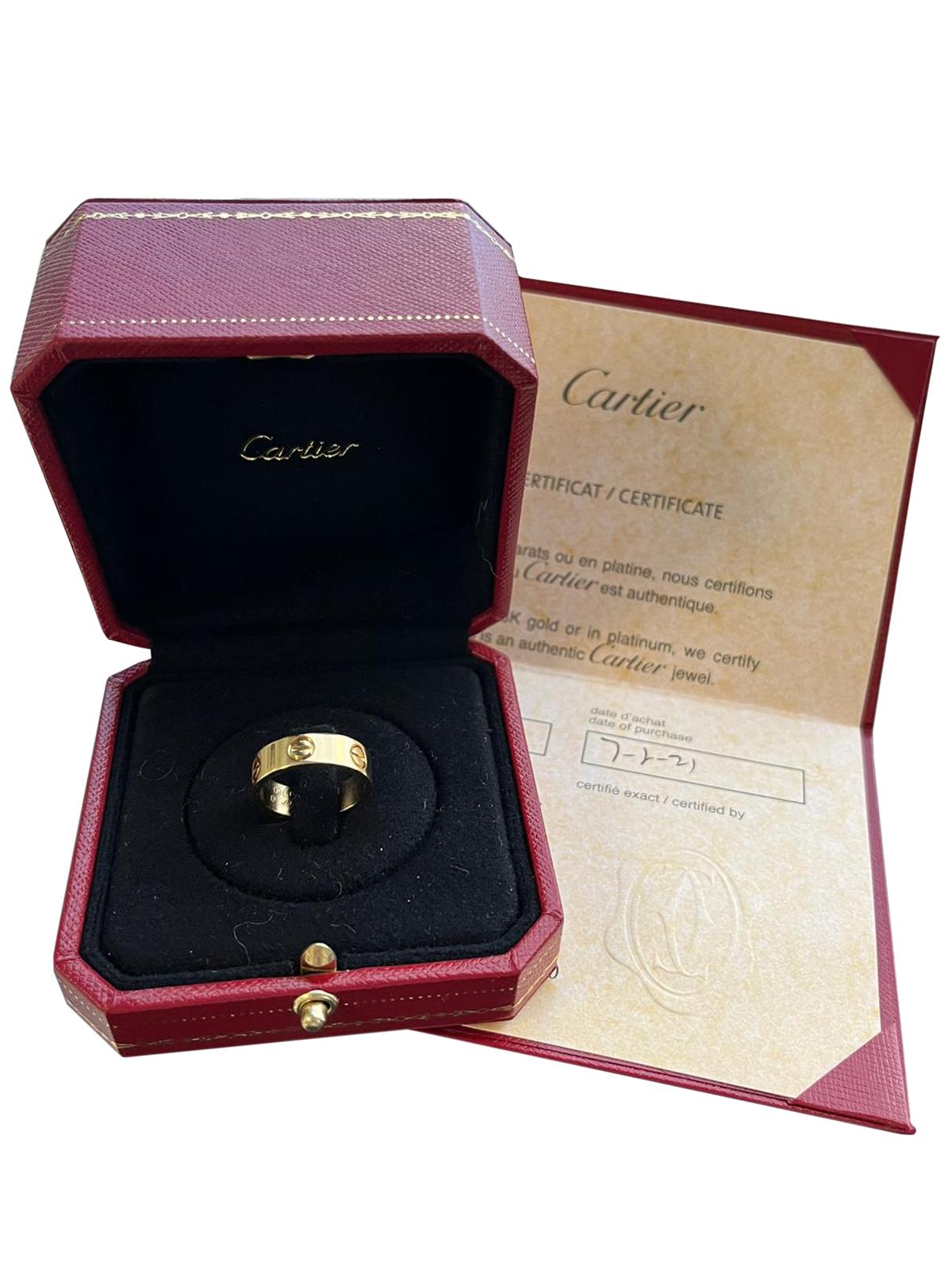 Cartier Love Ring 18K Yellow Gold 5.5 Size Wedding Band Excellent état - En vente à Aventura, FL