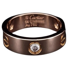 Cartier, bague d'amour 3 diamants en or rose 18 carats, taille 54