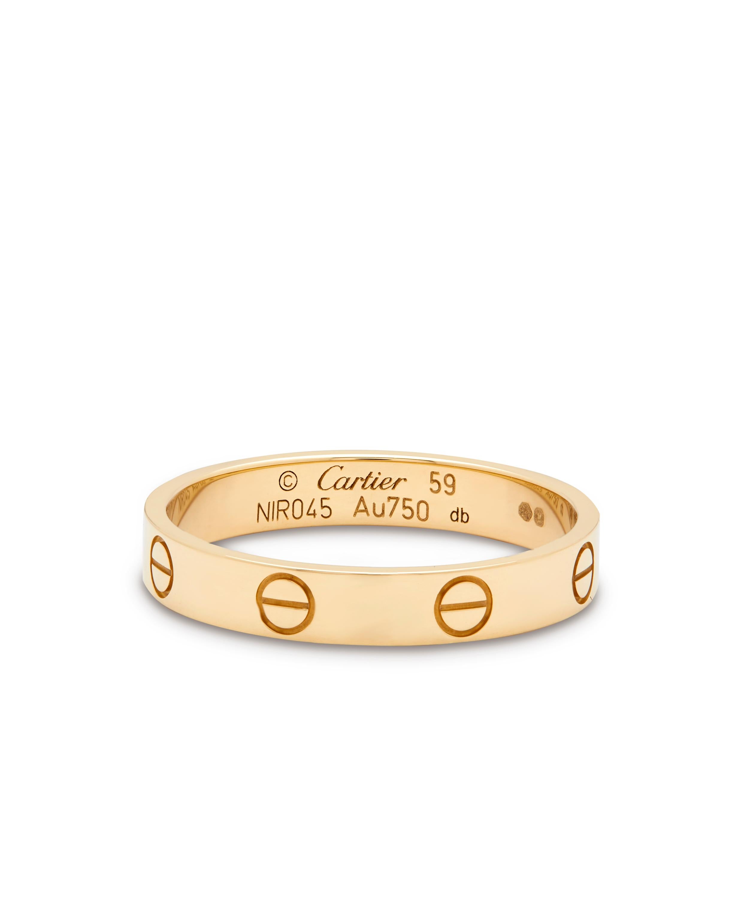 Cartier’s Iconic Love ring.

A symbol of inspired Love, and a must have for a discerning jewellery buyer. Perfect Gift to open in that beautiful red iconic box.  

Signed Cartier:
Stamped with makers marks 
Model number: B4085059
Serial number: