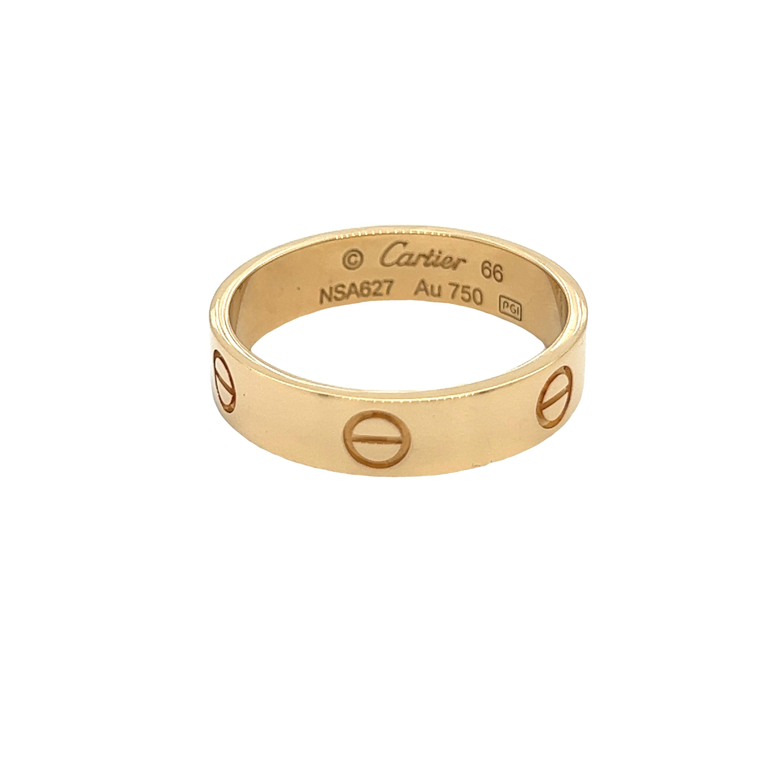 Cartier’s Iconic Love ring.

A symbol of inspired Love, and a must have for a discerning jewellery buyer. Perfect Gift to open in that beautiful red iconic box.  

Signed Cartier:
Stamped with makers marks 
Model number: B4084666
Stamped