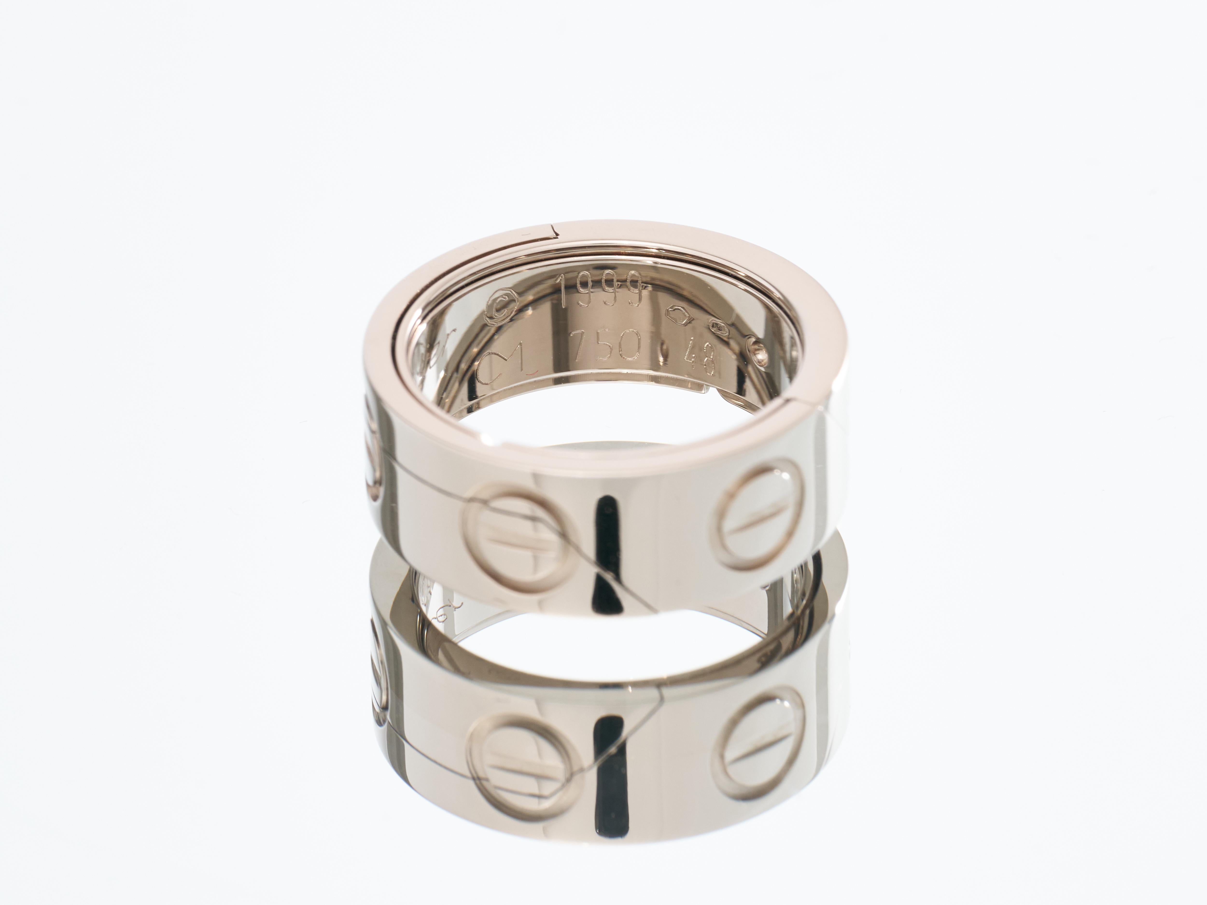 Cartier 
Astro 
Love Ring 

Converts into a Pendant 

1999 Limited Edition 

18kt White Gold 

Comes with original Box & Certificate

As a ring it is sized accordingly:
Size I 
EU 48 

It transforms into a 3 ring globe to be worn as a necklace