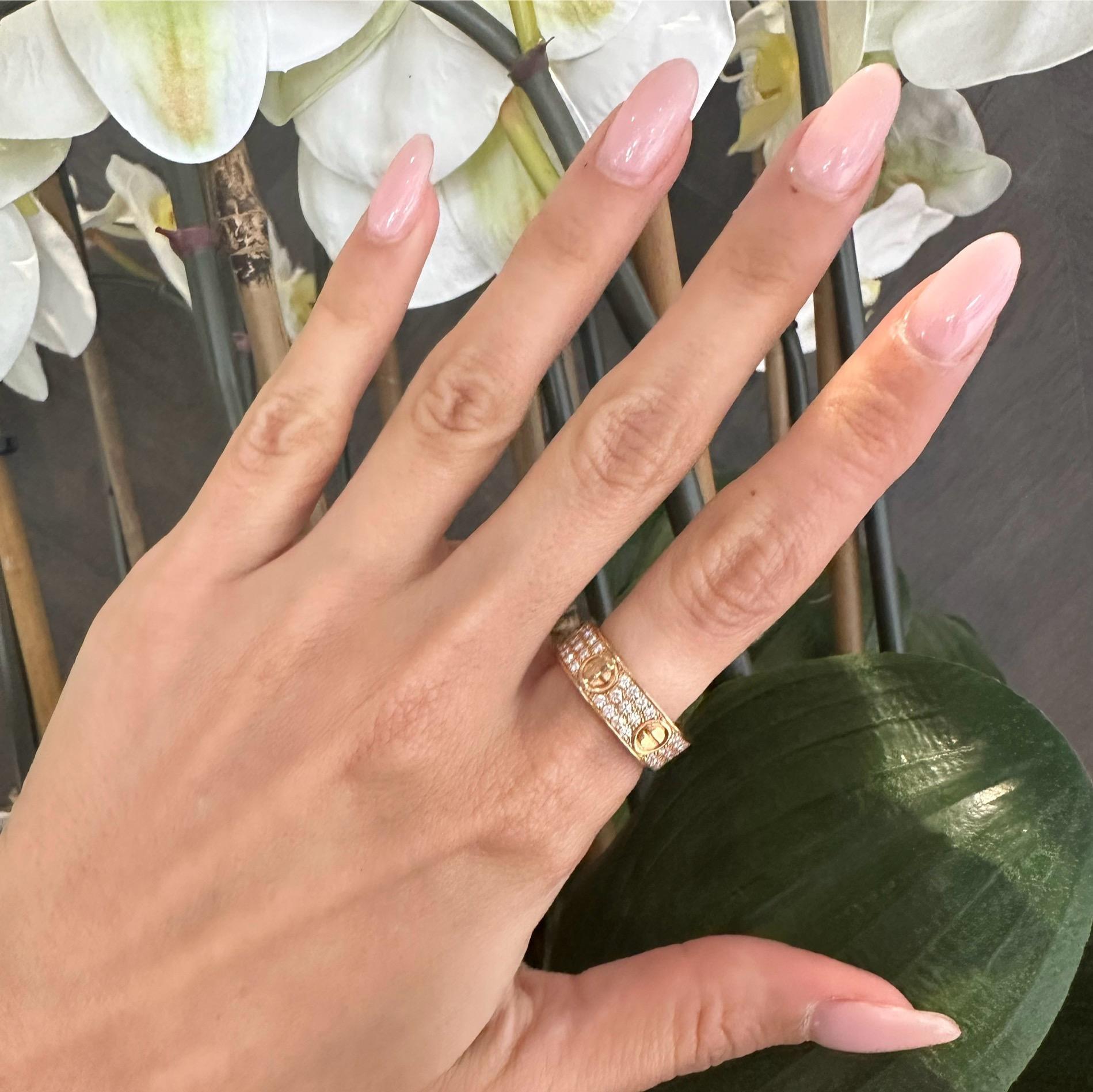 Brand: Cartier
Model Name: Love
Material: Rose Gold
Metal Purity: 18k
Stones: 66 diamonds
Carat Weight: 0.77 ct
Ring Size: 55 (euro) ; 7.25 (US)
Ring Width: 6.5 mm
Includes: Receipt of Purchase and Cartier Certificate
Year Purchased: 2023