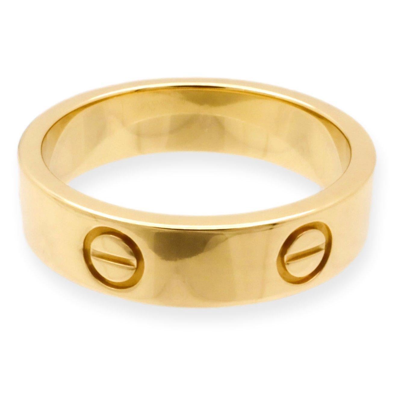 Cartier ring from the LOVE collection finely crafted in 18 karat yellow gold with screw motifs. Measures 5.5 mm wide. Ring is fully hallmarked with logo , serial numbers, size and metal content.

Ring Specifications
Brand: Cartier
Style: Love