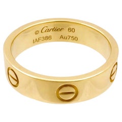 Bague Love de Cartier en or jaune 18K 5.5mm Taille 60 (US 9)