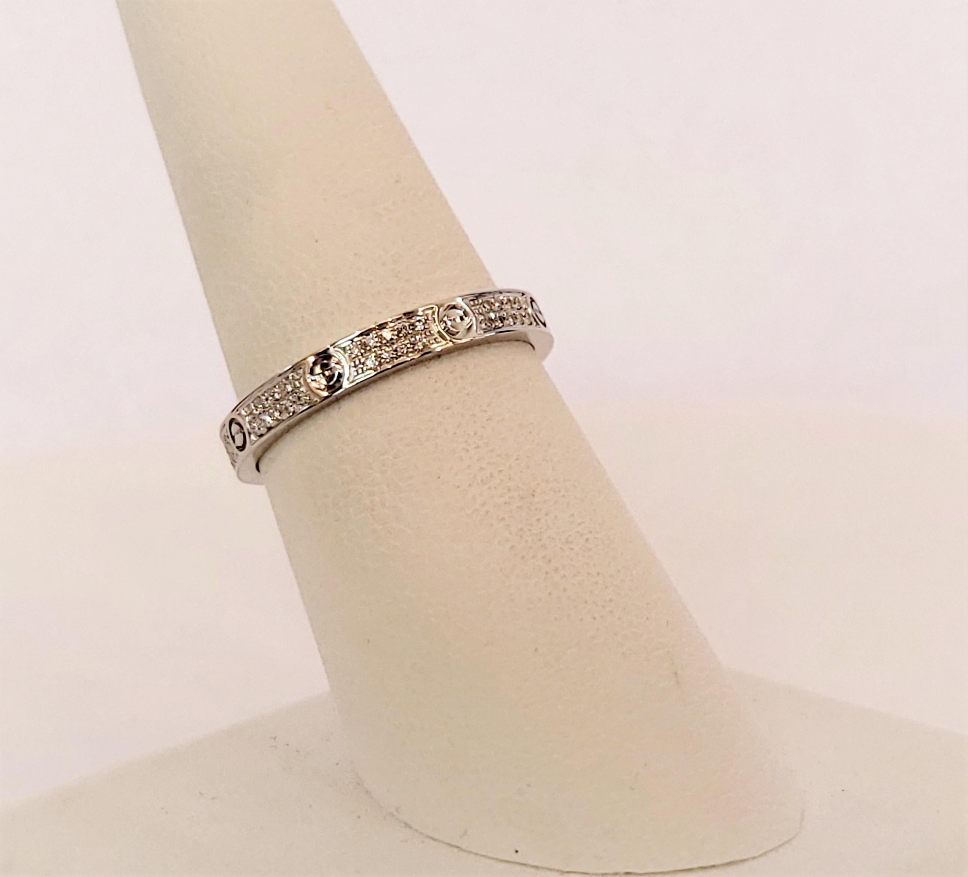 LOVE ring Small model 
Material: 18K White gold
Diamonds approx: 0.19 carats 
Thickness: 2.7 mm 
Ring Size 7.5 US (56)
Weight: 2.9 grams
Condition: New
Retail: $5,250