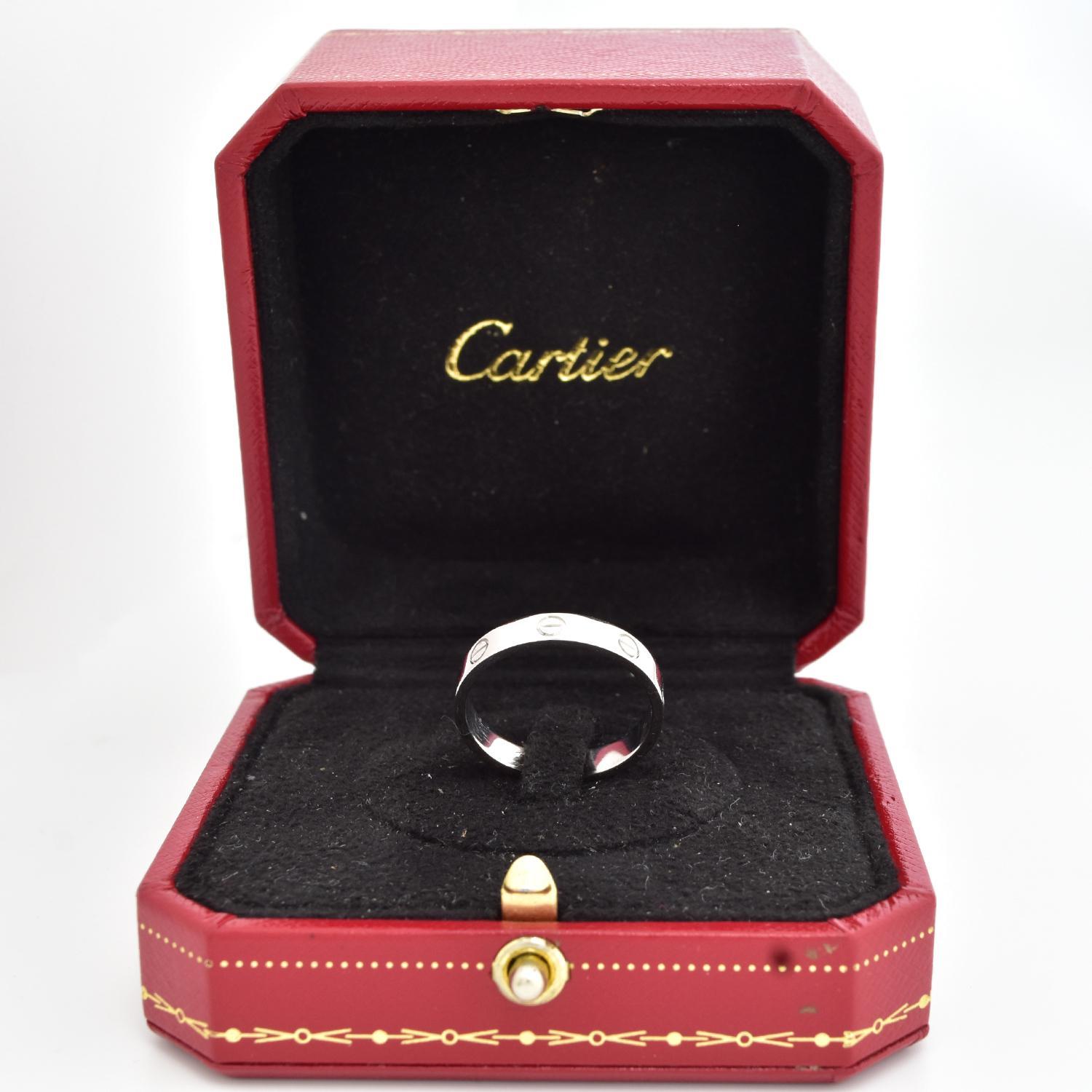Designer: Cartier  
Collection: Love  
Style: Ring  
Metal: Platinum
Metal Purity: 950 
Size: 59 (Euro) ; 8.75 (US)  Pt950AU750  

Contact us for more information.  
CAN BE POLISHED UPON REQUEST  
We specialize in finding and selling high quality