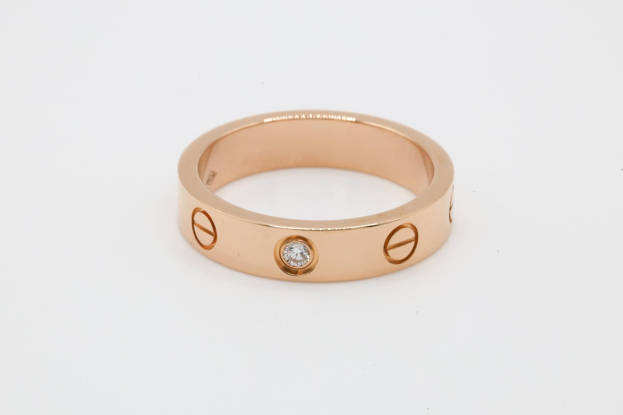 -Size 56
-Includes 1 diamond 
-Comes with Box & Papers 