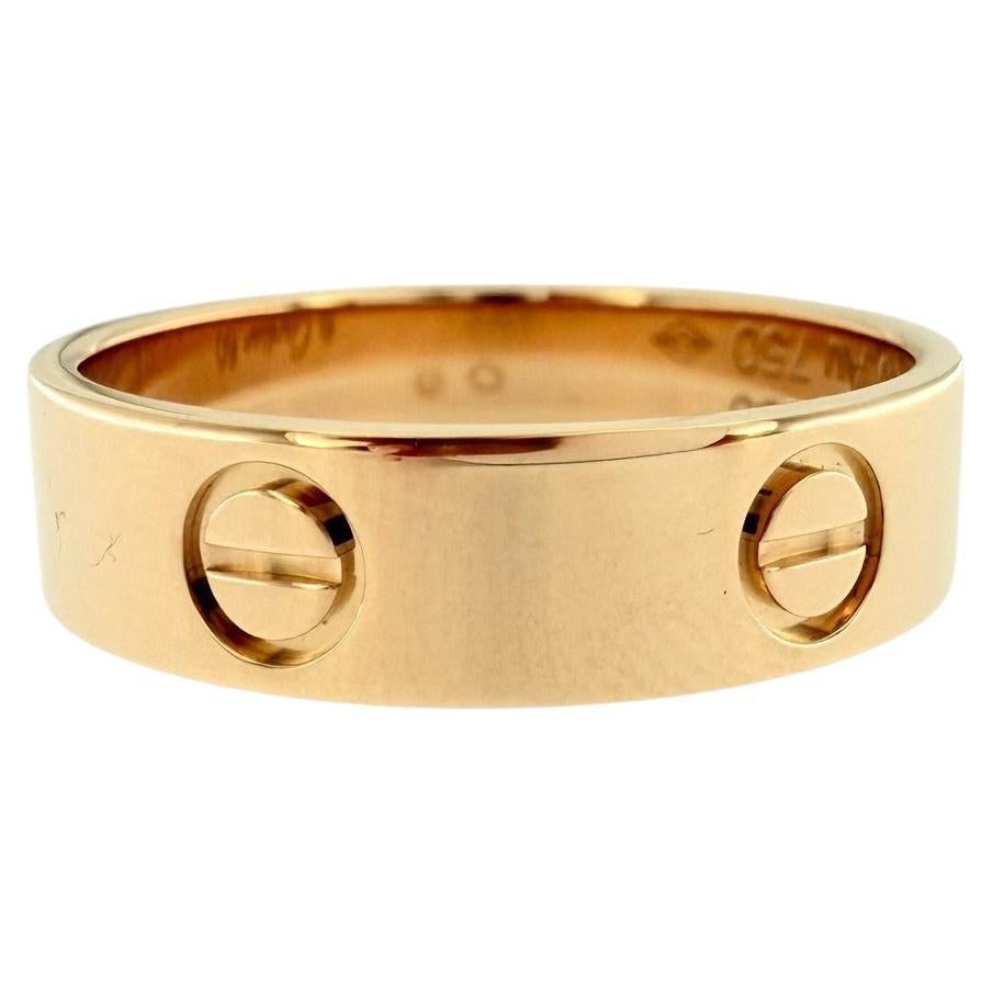 Bague Love de Cartier en or rose - taille 60 en vente