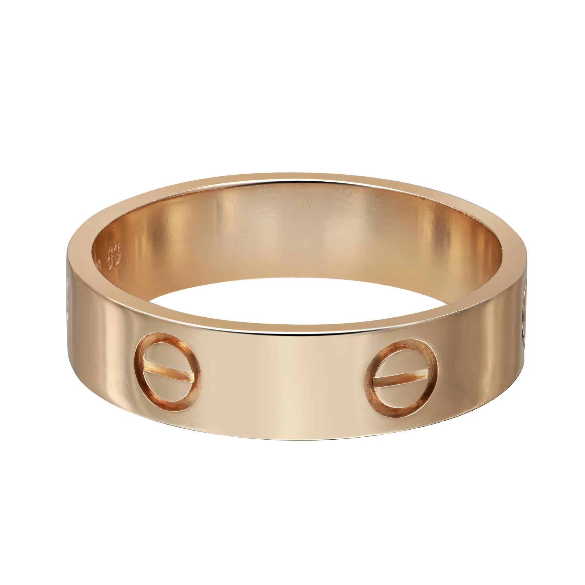 Cartier Love ring crafted in 18K yellow gold. Ring size 63 US 10.5. Width: 5.6mm. Total weight: 7.11 grams. Great pre-owned condition. Original box and paper are not included. Comes with a Chronostore appraisal and a presentable gift box.  
