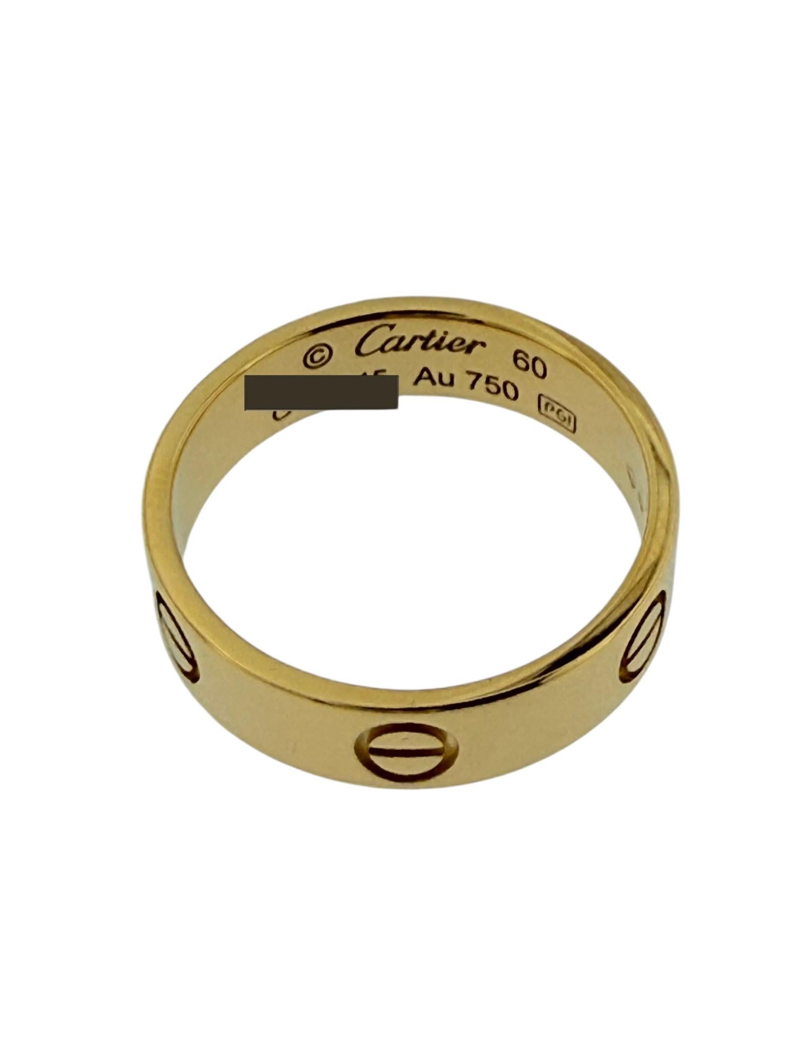 The Cartier Love Ring in Yellow Gold is a luxurious and iconic piece of jewelry created by the renowned French jewelry and watchmaker, Cartier. 

The ring is crafted from 18-karat yellow gold, which is known for its rich and warm color, as well as
