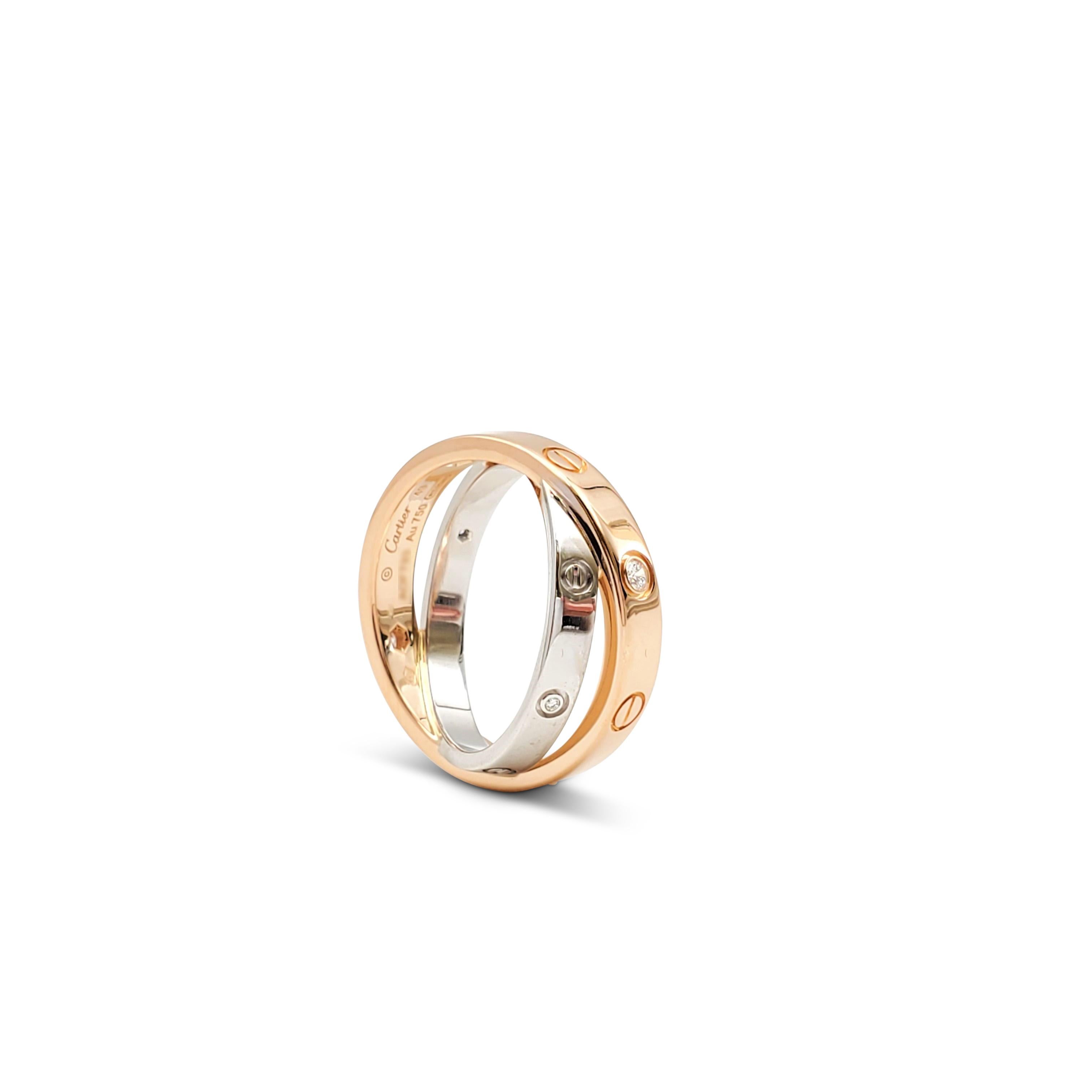 Authentic Cartier Love ring crafted in 18 karat rose and white gold.  Set with 6 round cut diamonds weighing an estimated .07 carats total.  The rose gold band measures 3.5mm and crosses over a slightly thinner white gold band, measuring 2.6mm. 