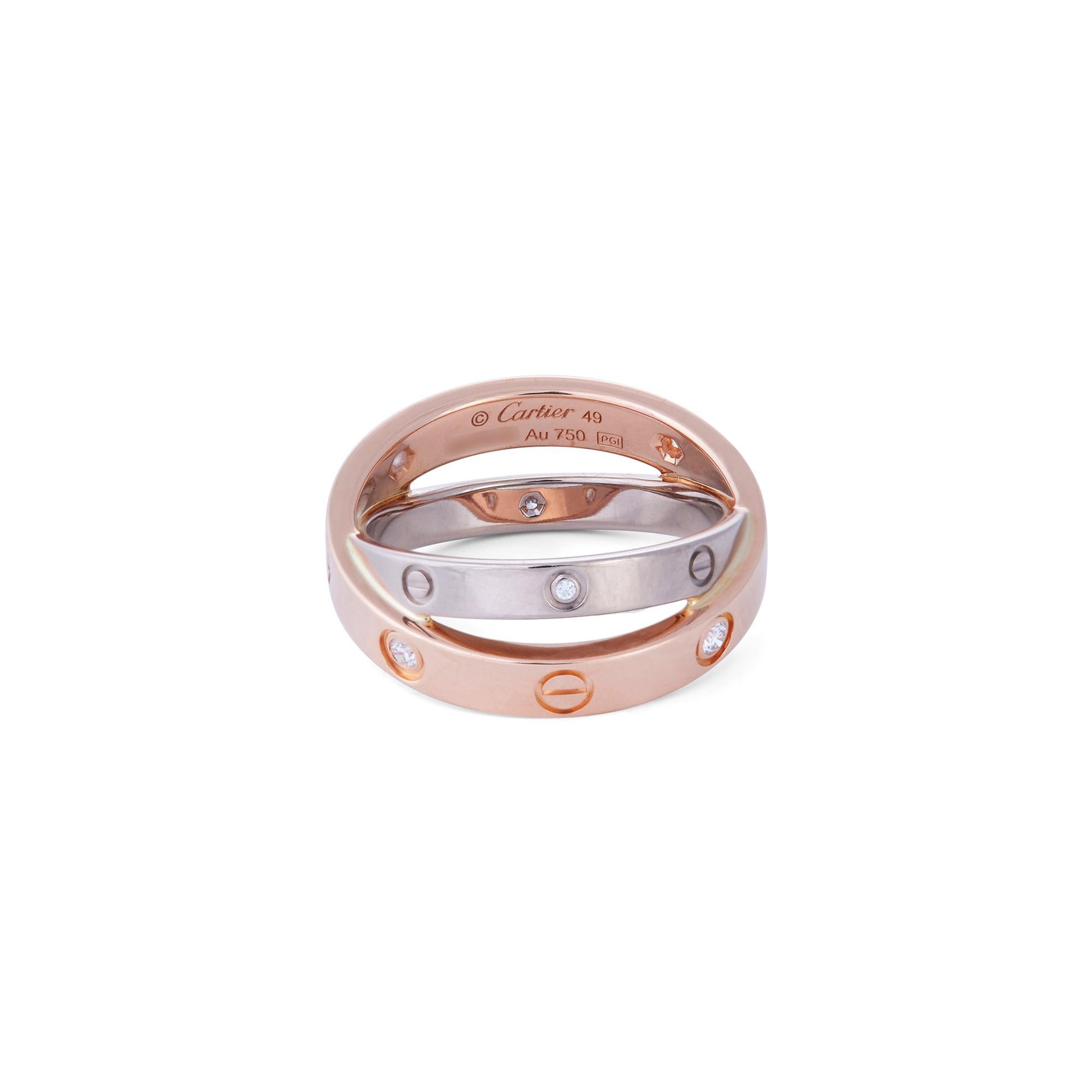 Authentischer Cartier Love Ring aus 18 Karat Rosé- und Weißgold. Mit 6 Diamanten im Rundschliff mit einem geschätzten Gesamtgewicht von 0,07 Karat besetzt. Das Band aus Roségold misst 3,5 mm und kreuzt sich mit einem etwas dünneren Band aus