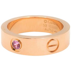 Bague « Love » de Cartier en or rose et saphir rose