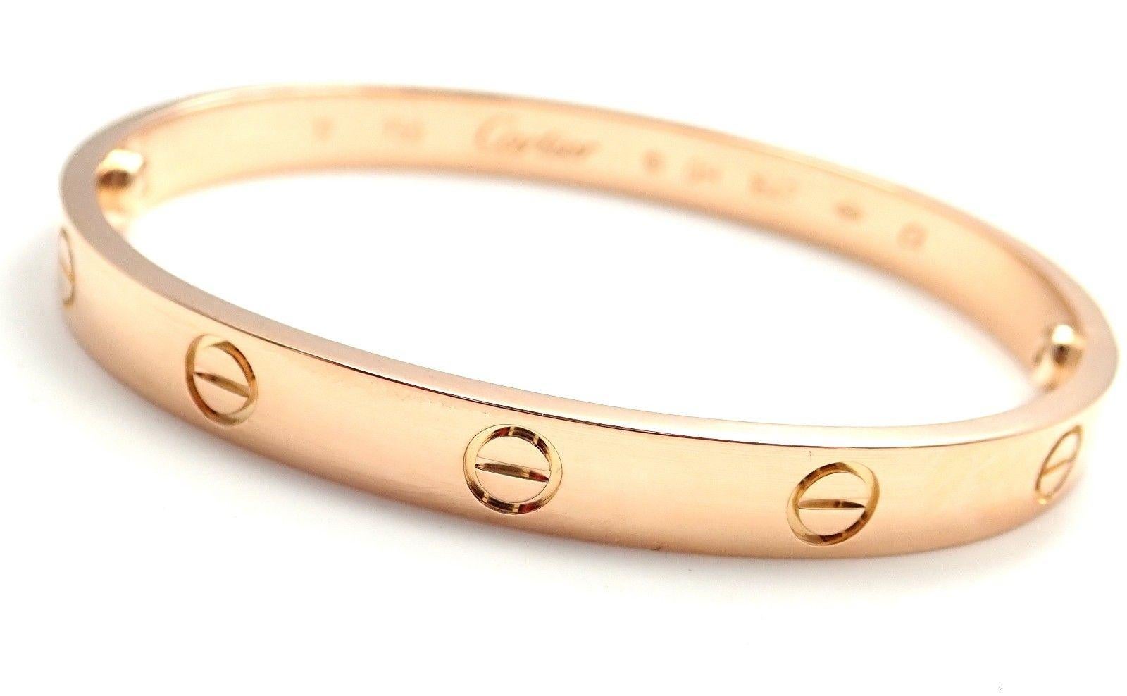 18k Rose Gold Love Bangle Bracelet by Cartier. 
Size 17.  
This bracelet comes with service paper from Cartier store in Japan, a Cartier Box and a Cartier 
screwdriver.
Details: 
Size: 17 
Weight: 32 grams
Width: 6.5mm 
Hallmarks: Cartier 750 17